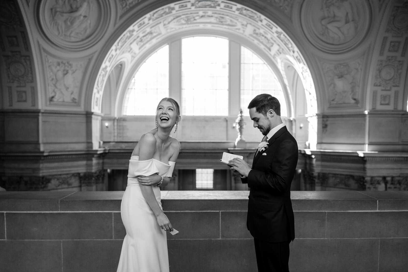 bride and groom having a ceremony at SF City Hall