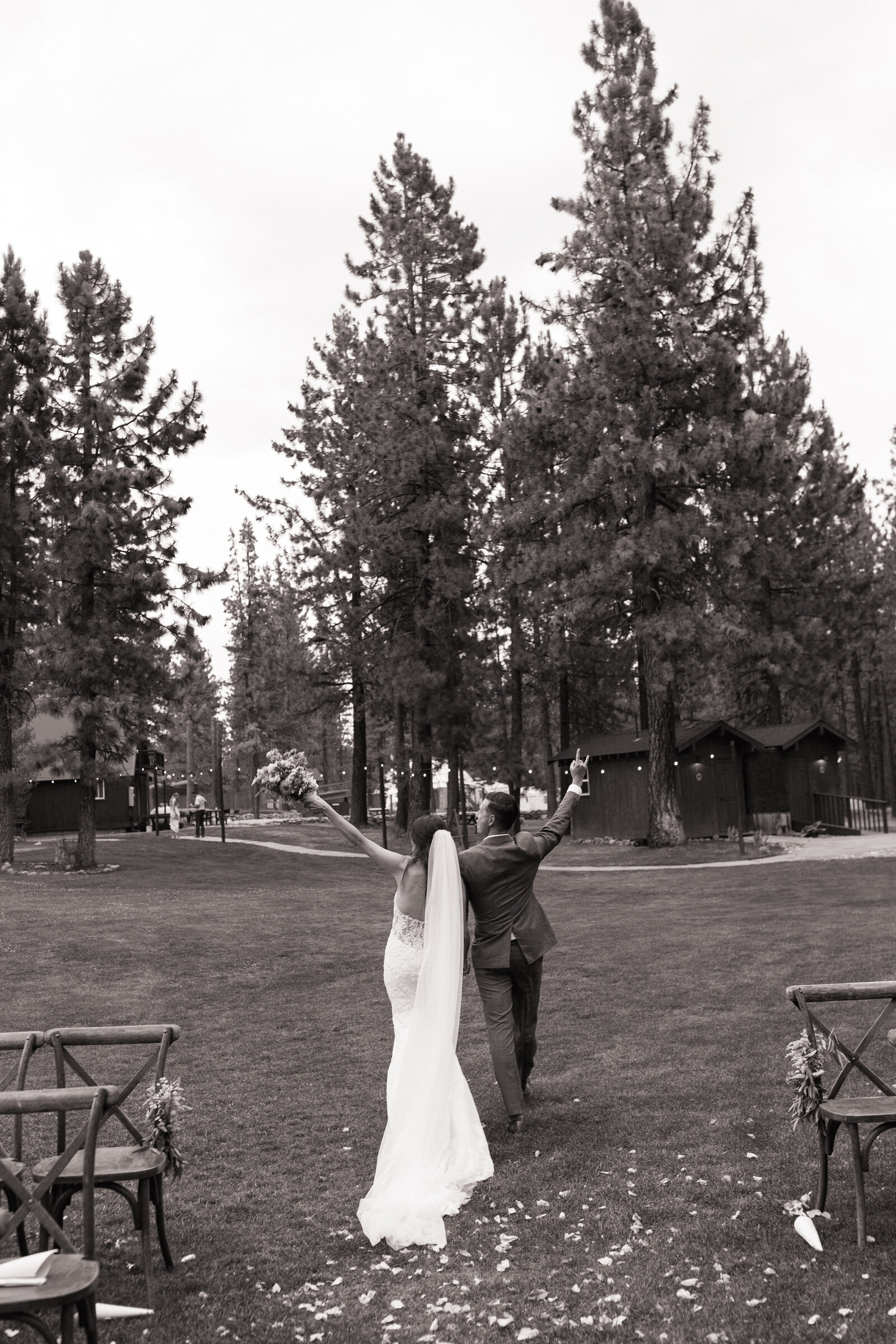 Romantic couple's portraits among trees at retro-inspired forest wedding in Tahoe