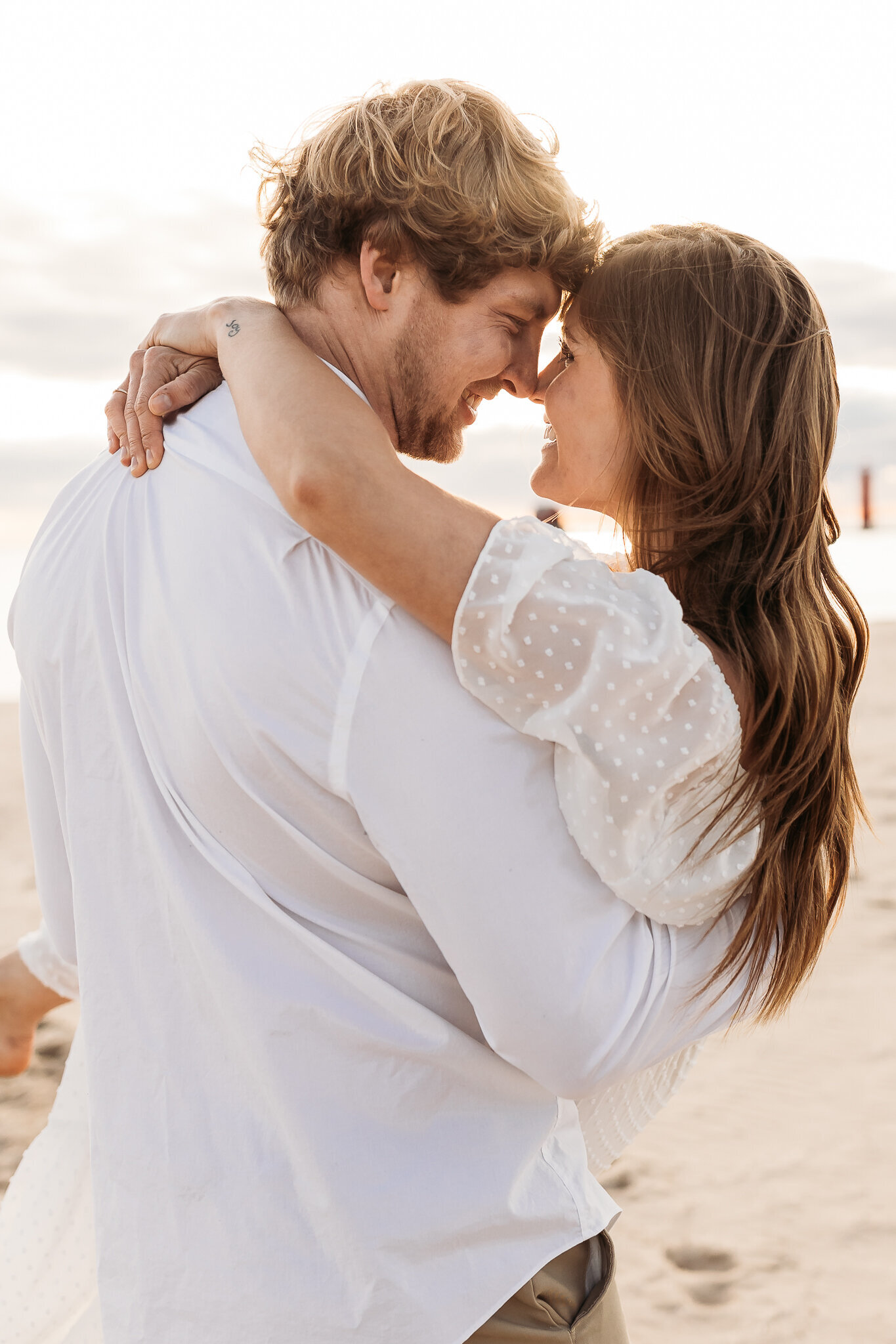 GRAND_HAVEN_AND_LAKE_MICHIGAN_ENGAGEMENT_PHOTOGRAPHER|Courtney_Lushaj_Photography_16