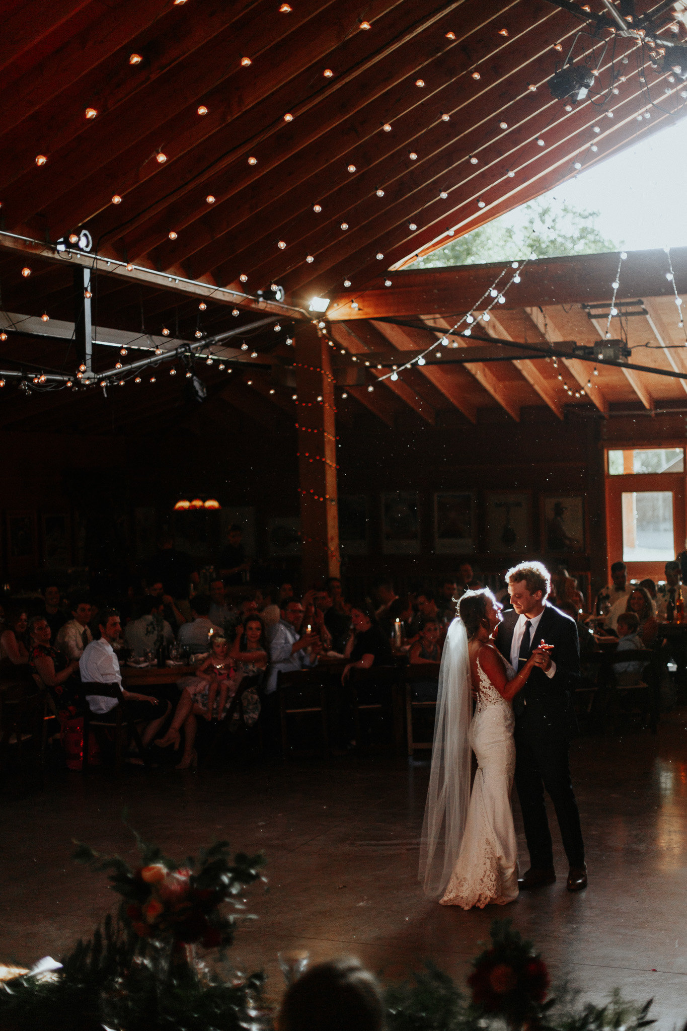 plante bluegrass barn, bride and groom having their first dance.