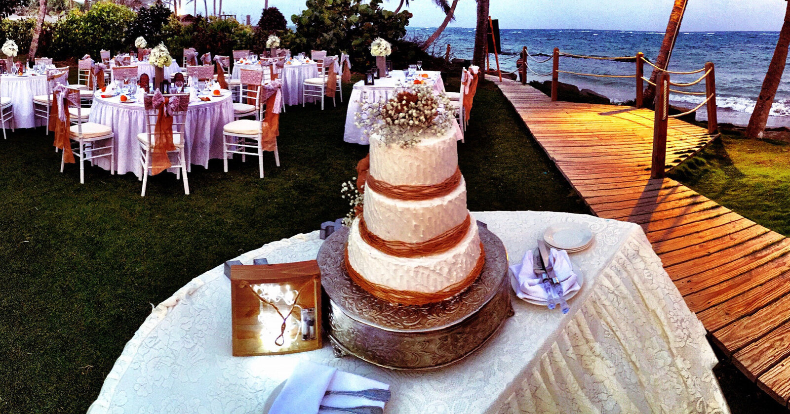 Rustic wedding cake setup at outdoor Chicago wedding with Charizma DJ package