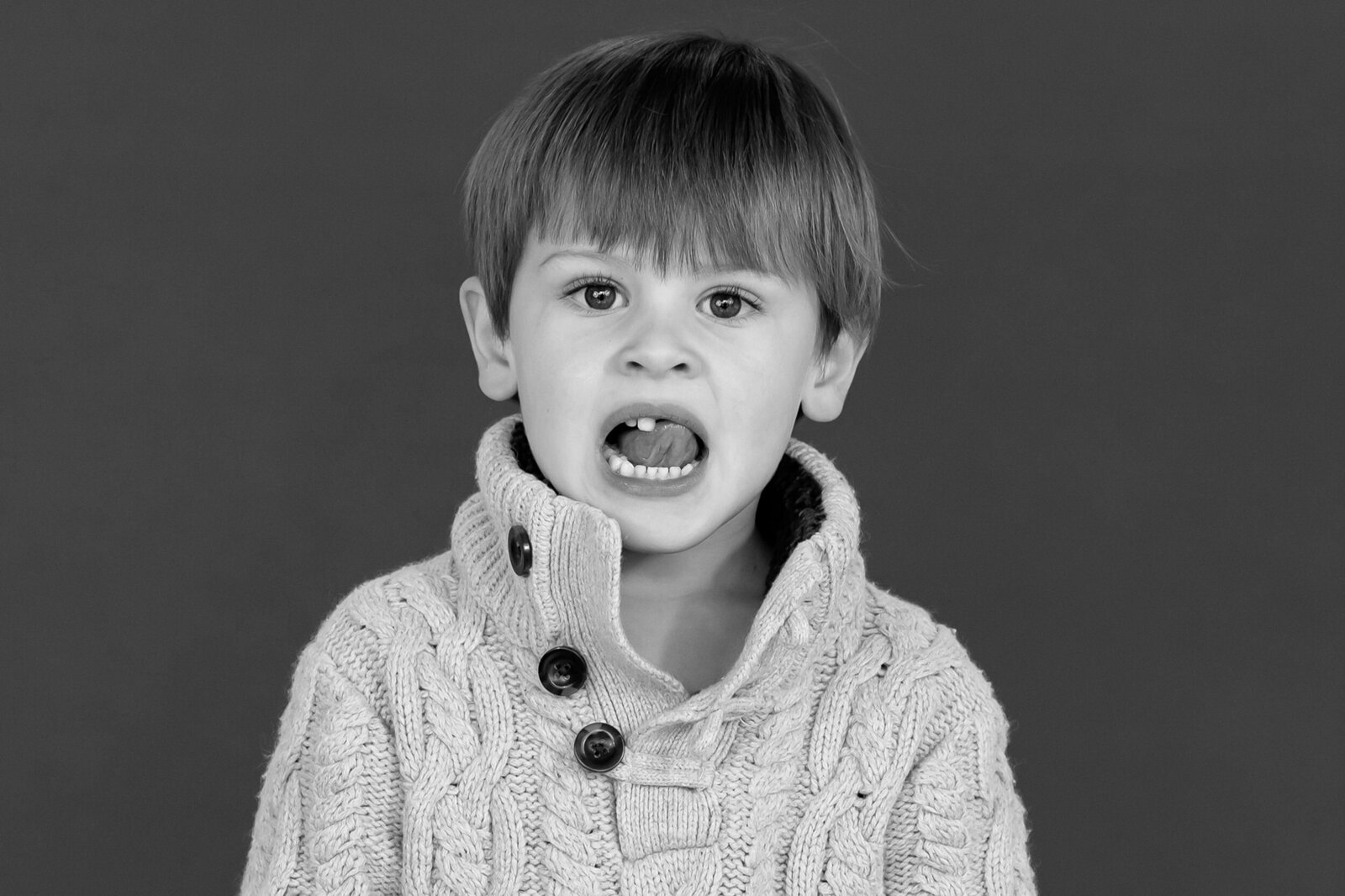 Authentic school portrait of a student, highlighting personality and timeless background