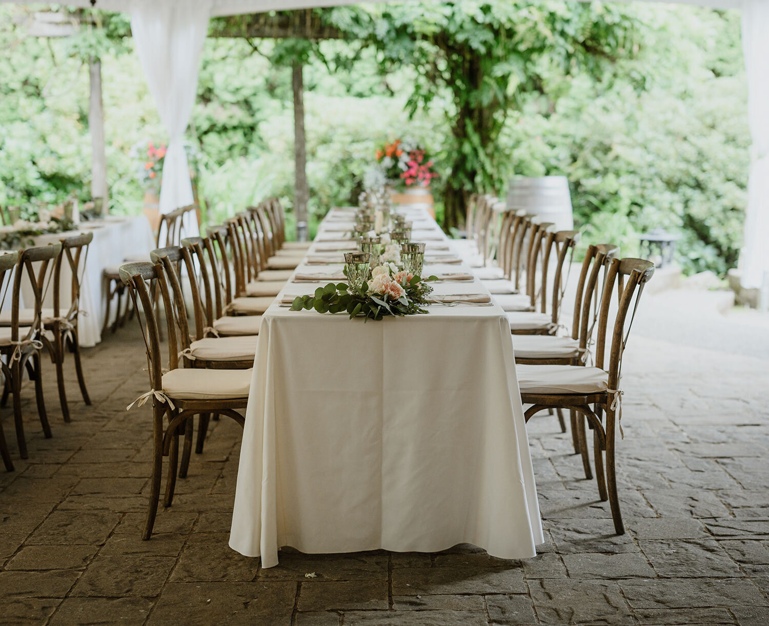 Outdoor long table with greenery
