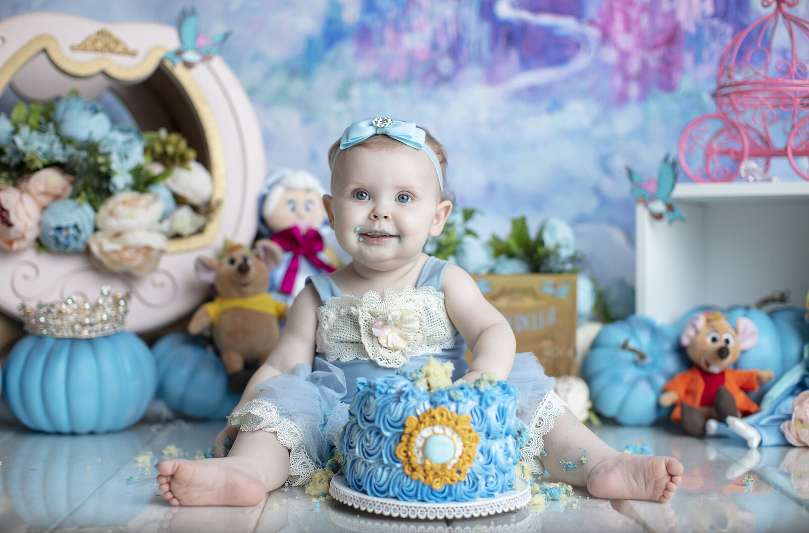 Cinderella themed cake smash with a Dallas cake smash photographer.