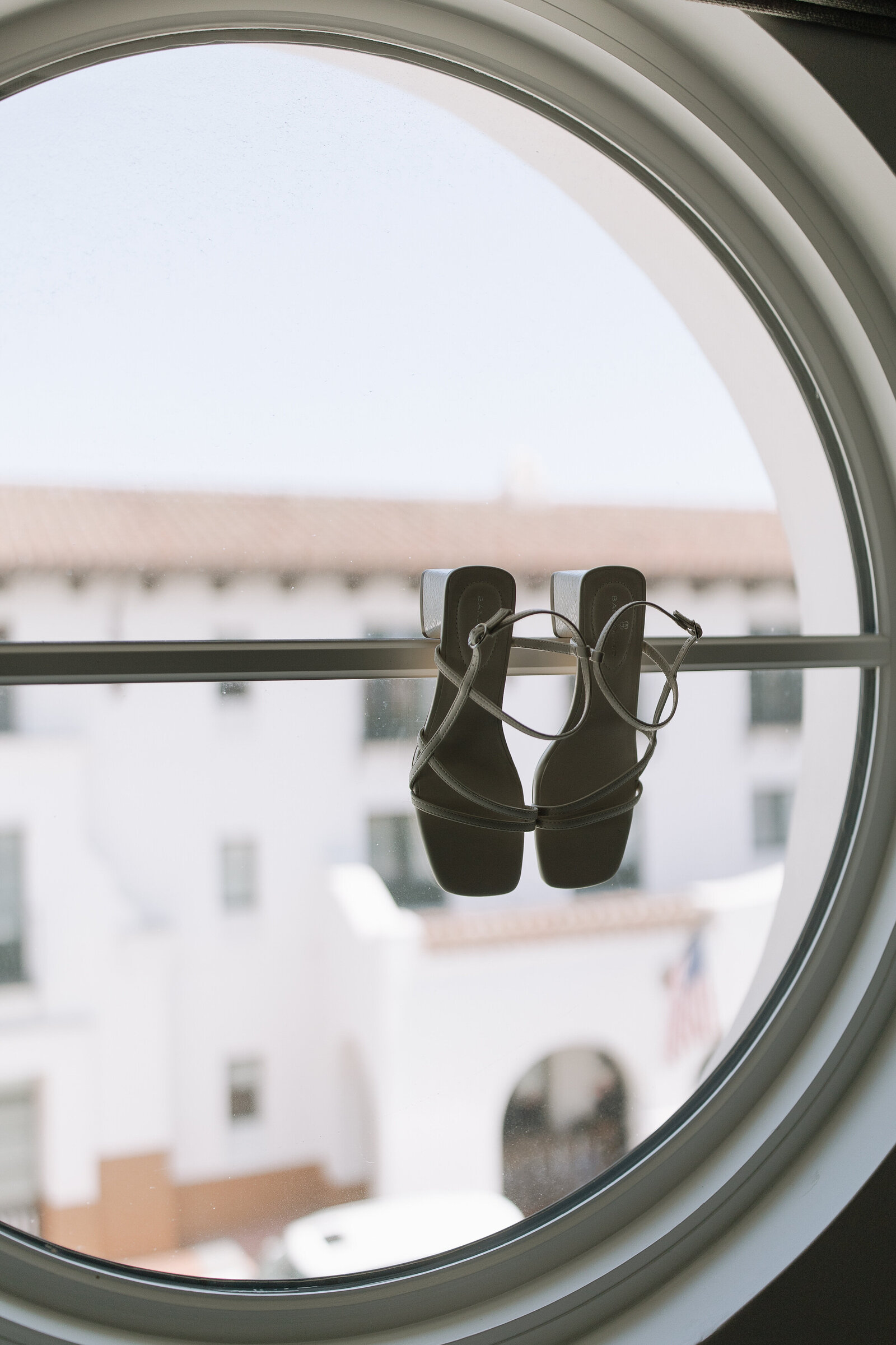 Bride's heel placed in windowsill  taken by wedding photographer Northern California, Erica Rochelle