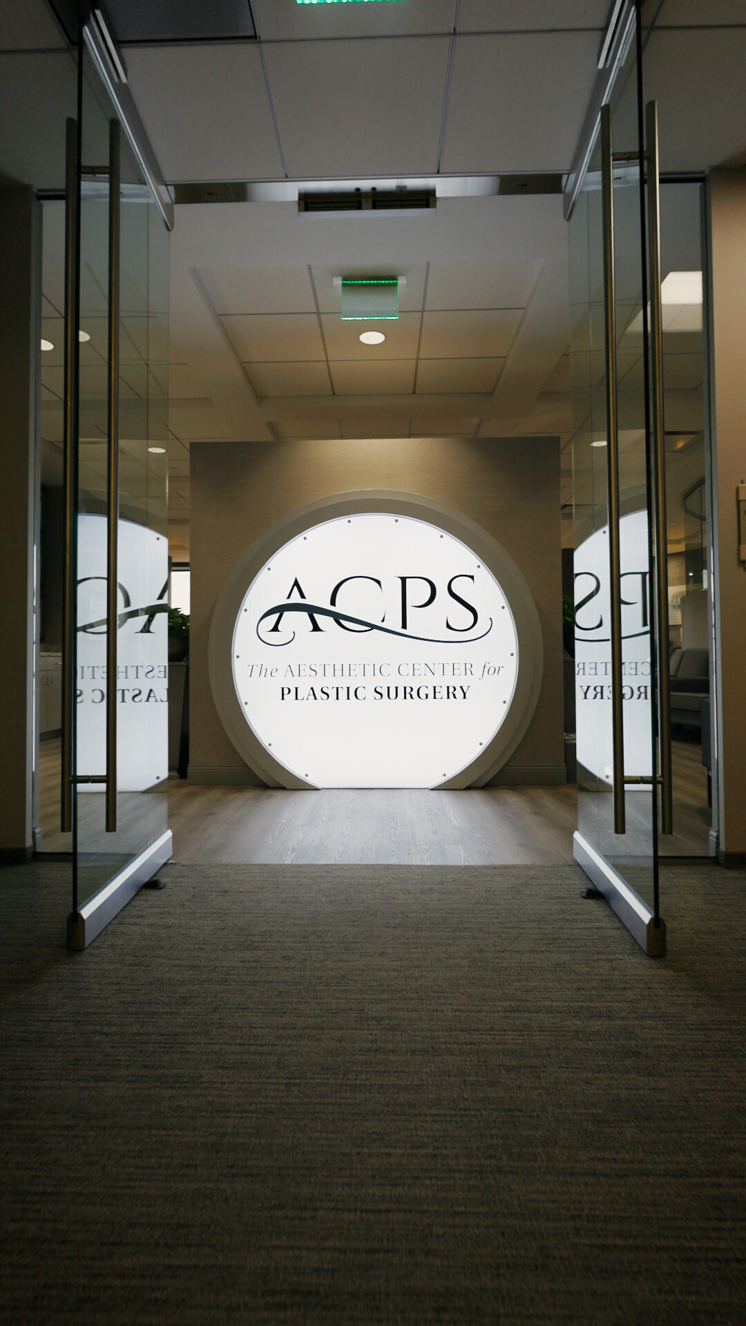 Entrance to the ACPS practice with the logo on the wall