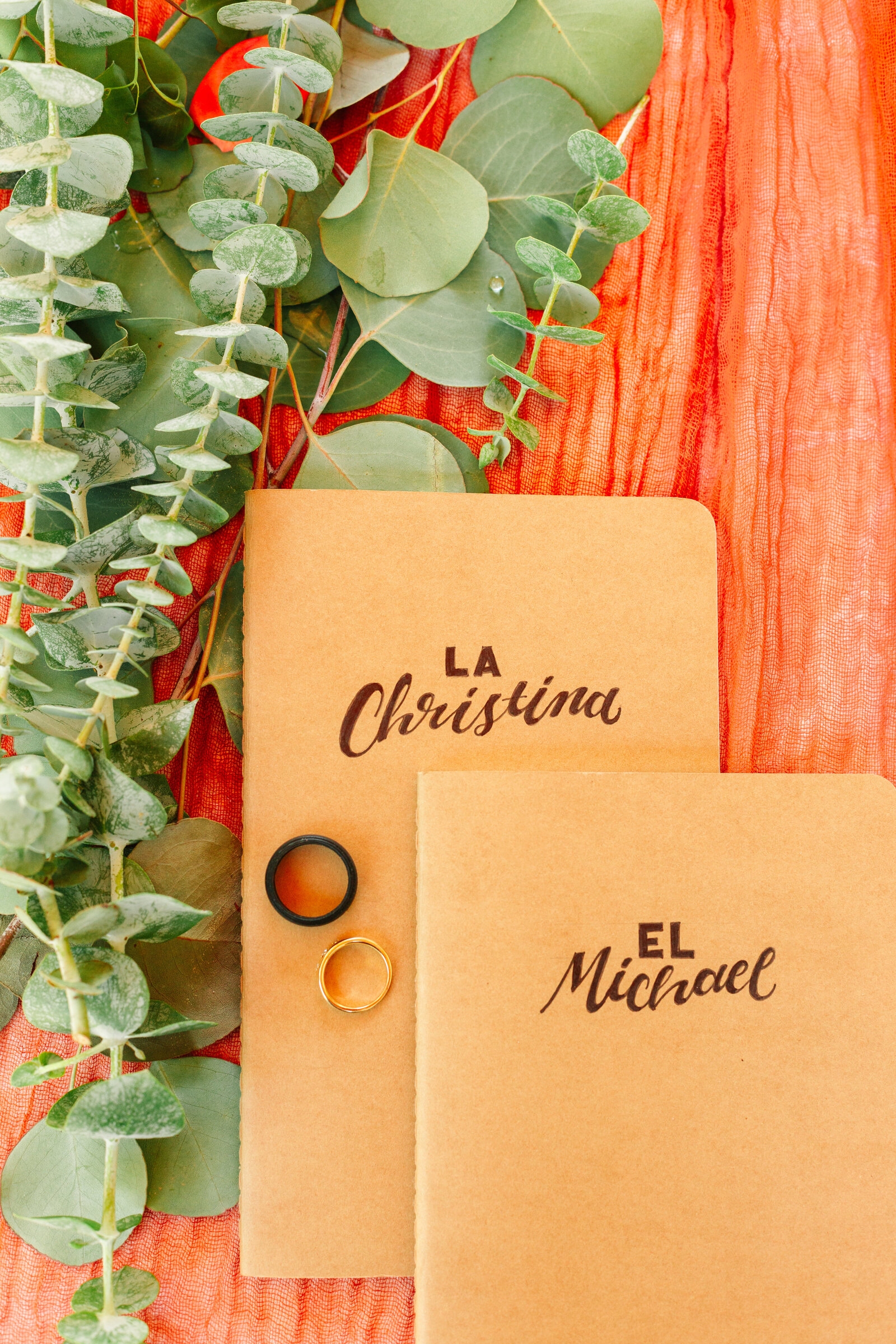 Colorful and boho wedding rings at an intimate elopement at a cabin at Big Bear Lake, California.