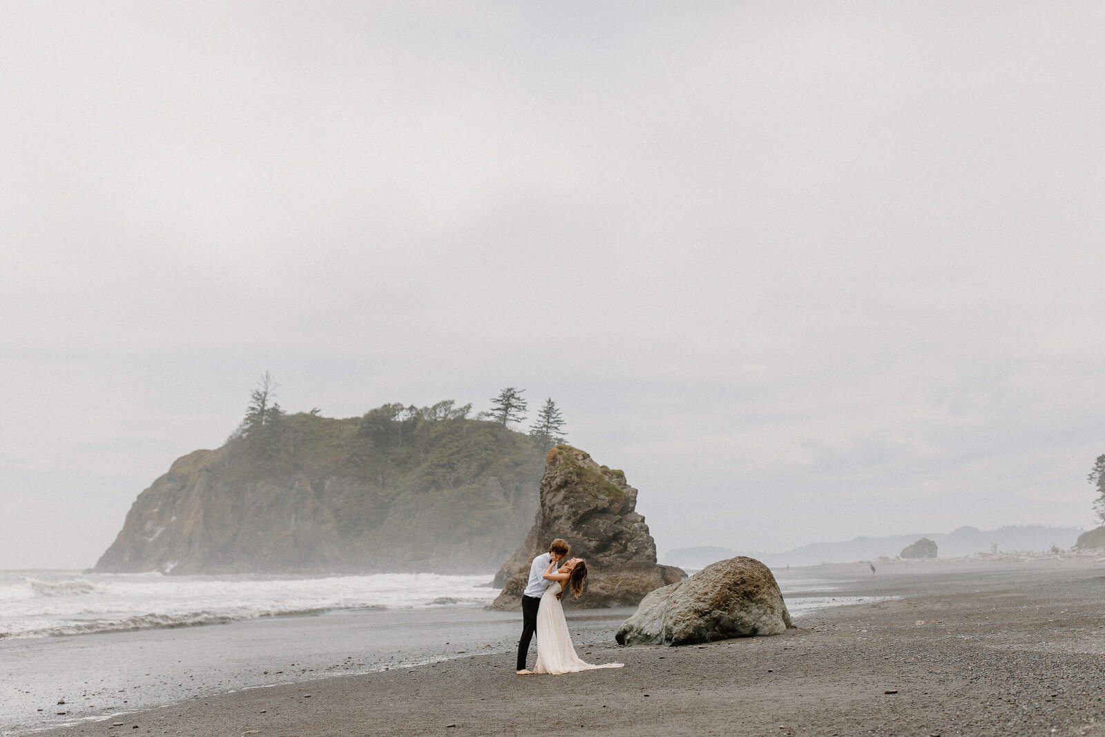Bride and groom share their vows during their elopement ceremony in the middle of the Hoh Rainforest.