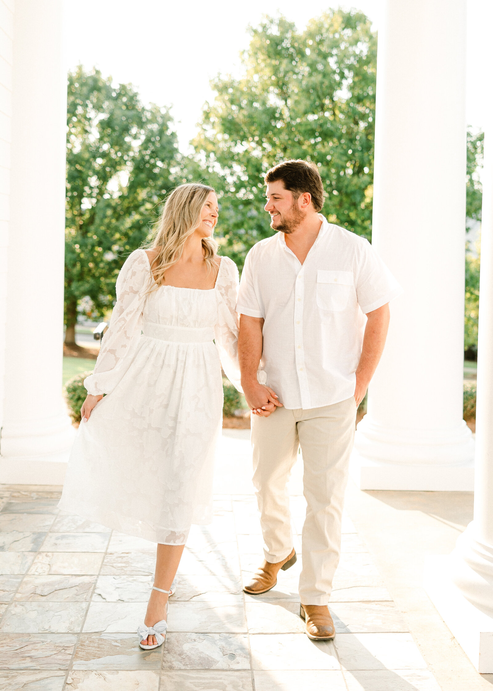 Golden hour engagement photo of Kelby and Mason, taken by Abby Bell Photography. Romantic fine art photography in Alabama.
