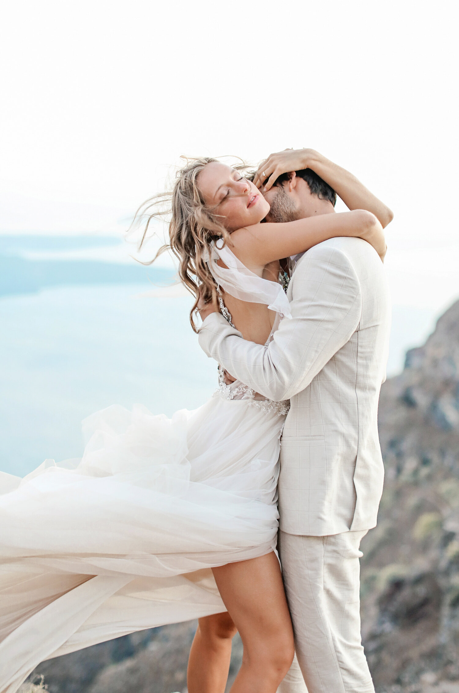 Santorini-wedding-couple-hugging