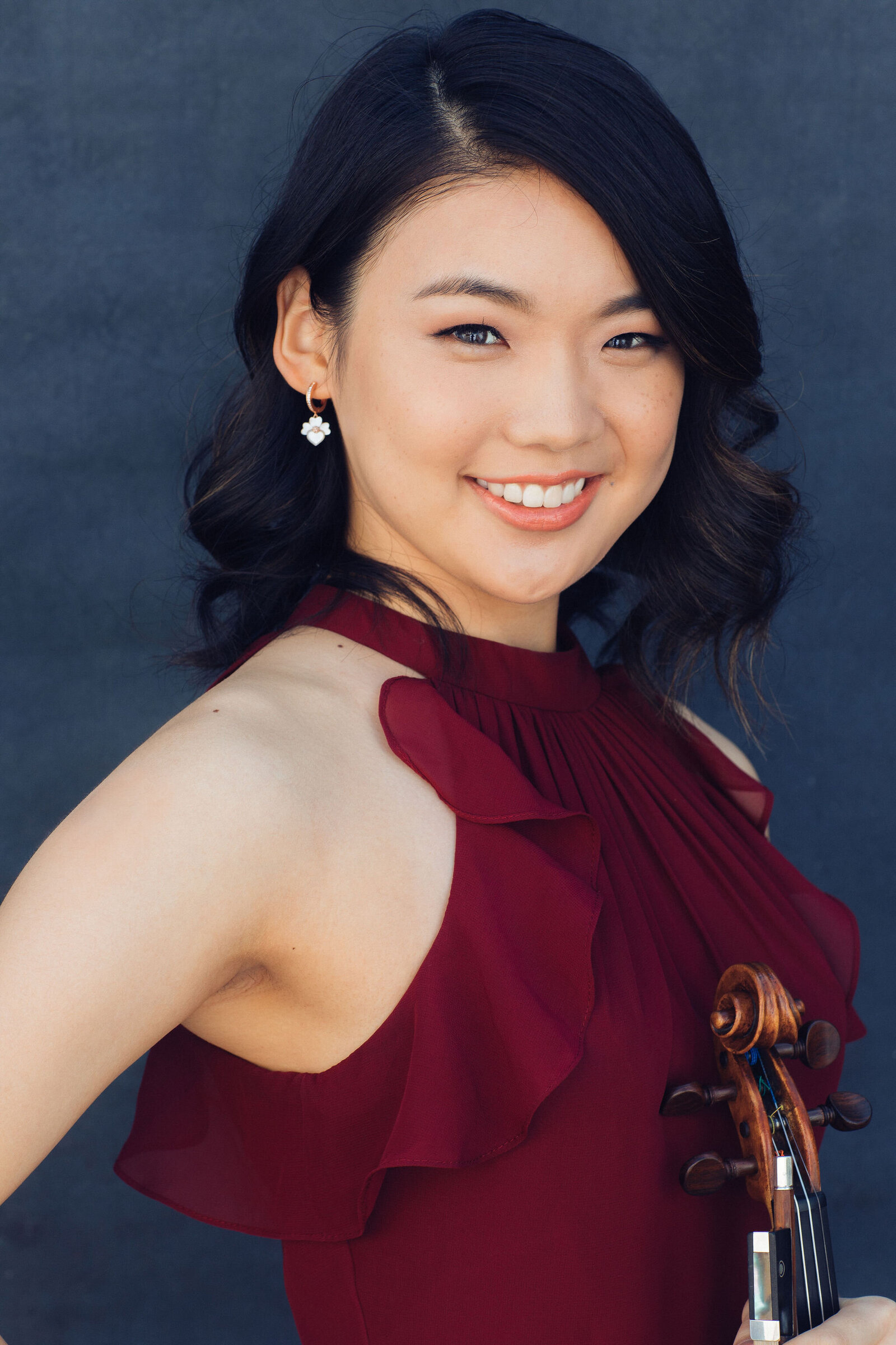 Headshot Photograph Of Young Woman In Maroon Sleeveless Los Angeles