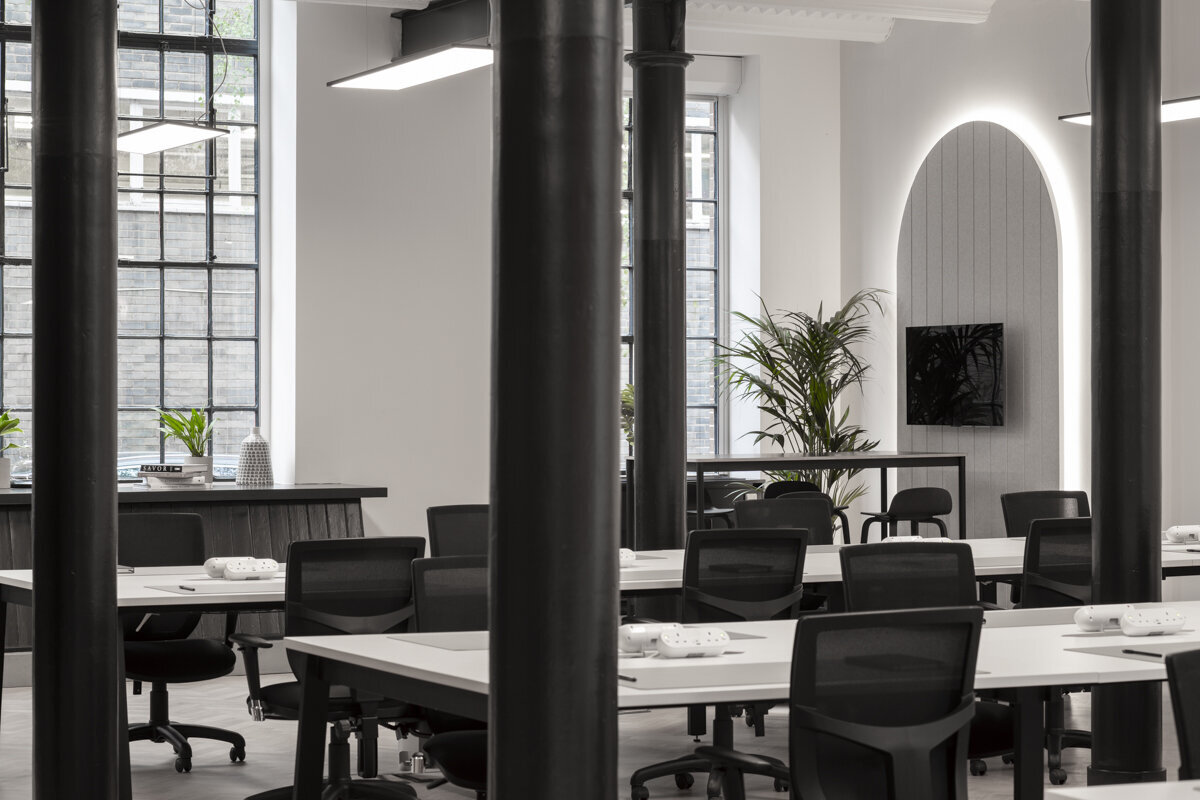 Industrial office interiors-flexible desks and partitions for hybrid working.