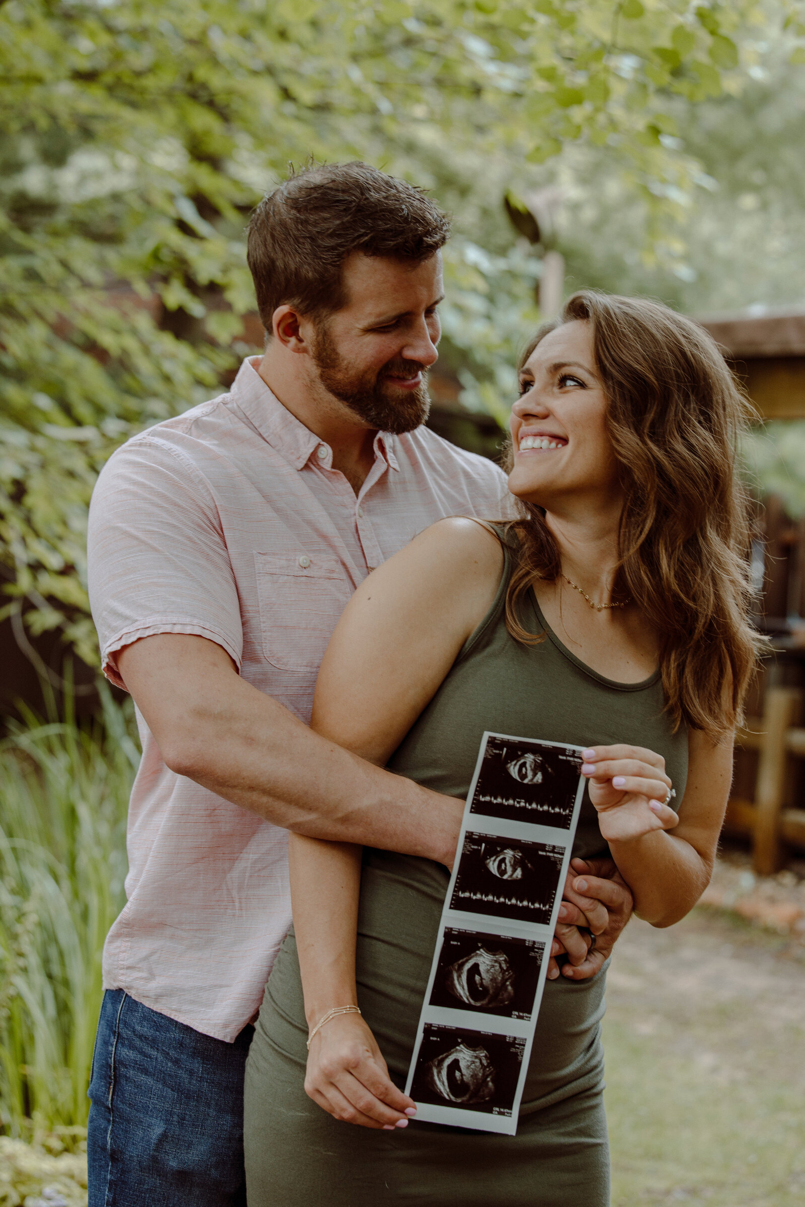 Katie and Owen Anniversary Photos and Baby Reveal at Blue Bridge Traverse City Michigan by Madi Taylor Photo-12