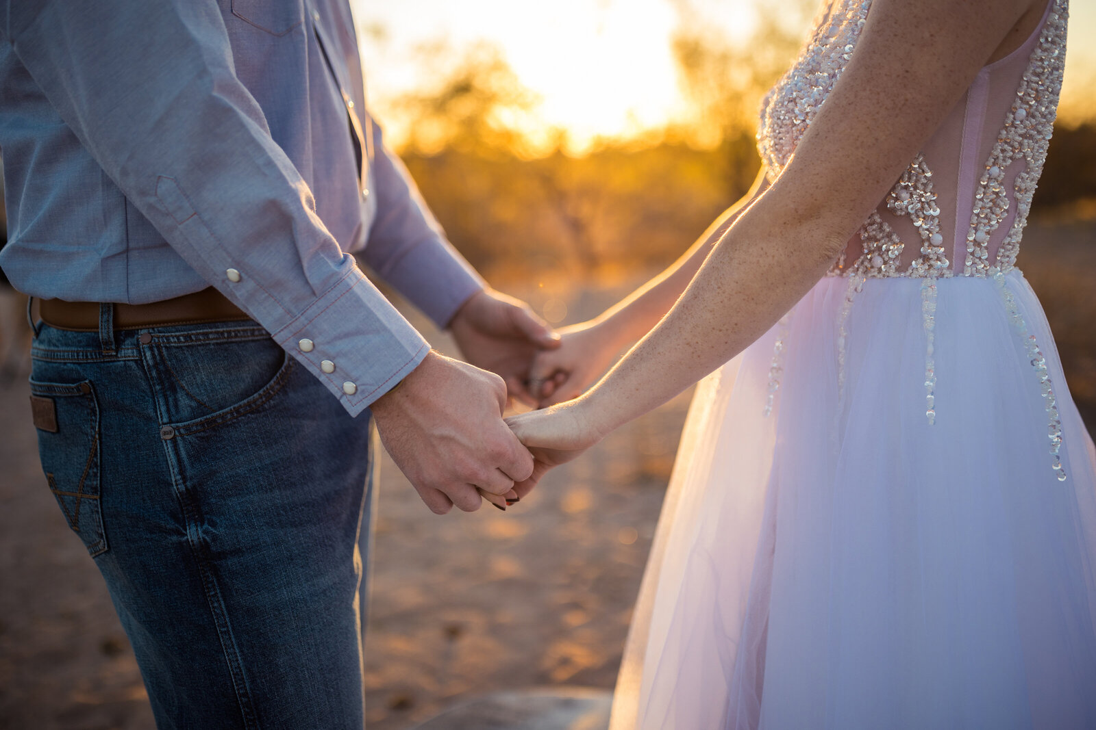 holding hands during elopement ceremony