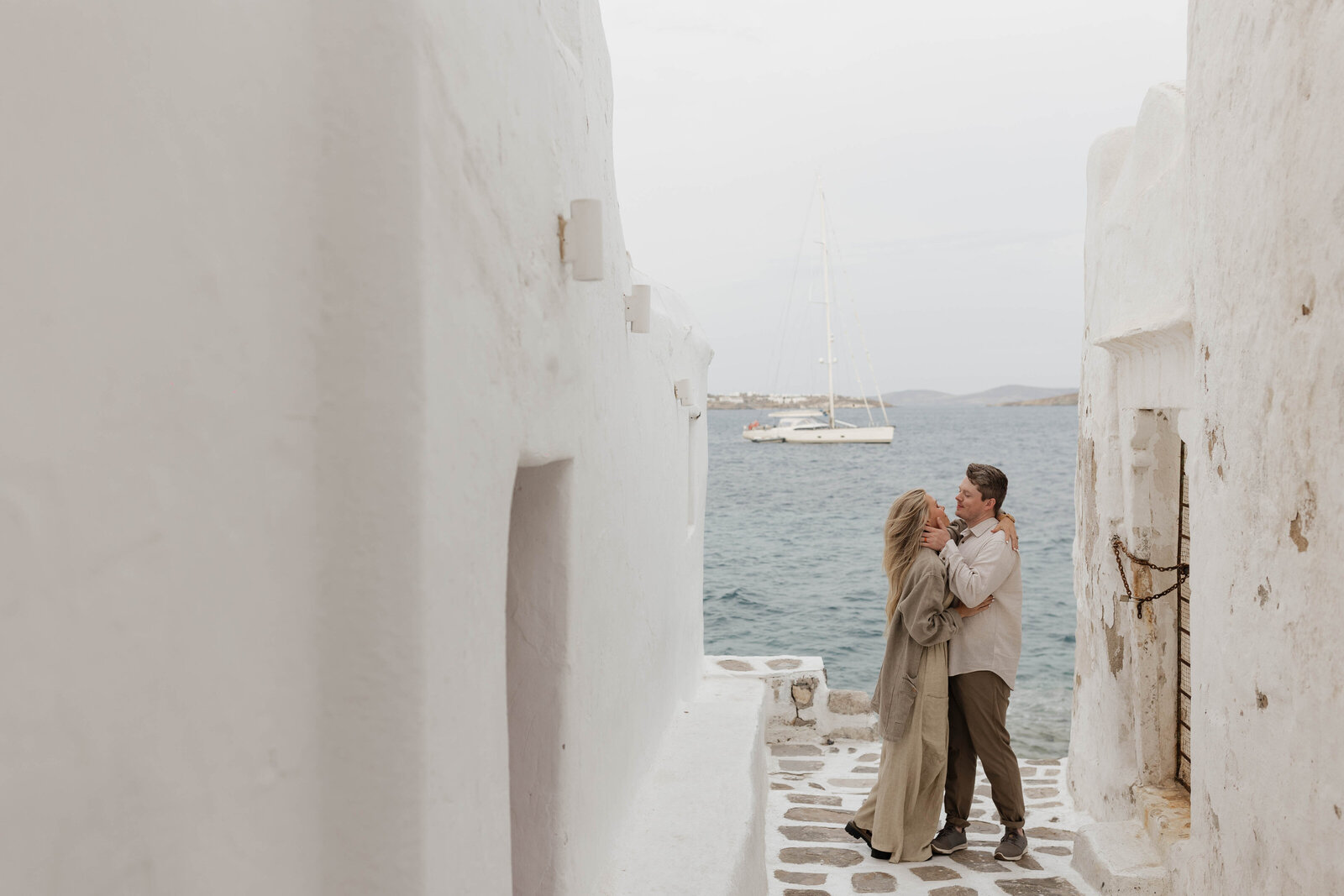 An elopement photographer capturing a special moment in Greece.