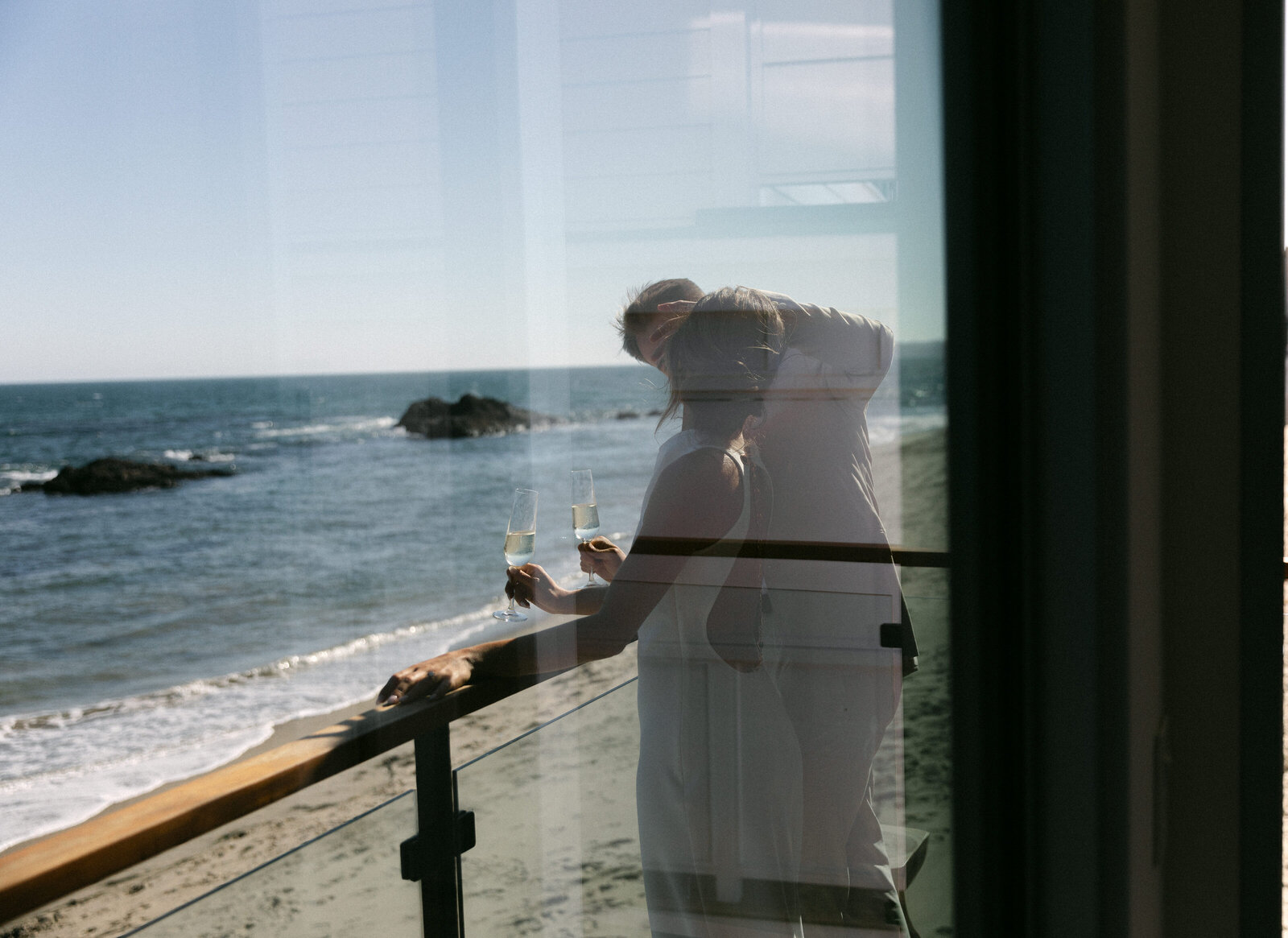 couple on the deck with champagne