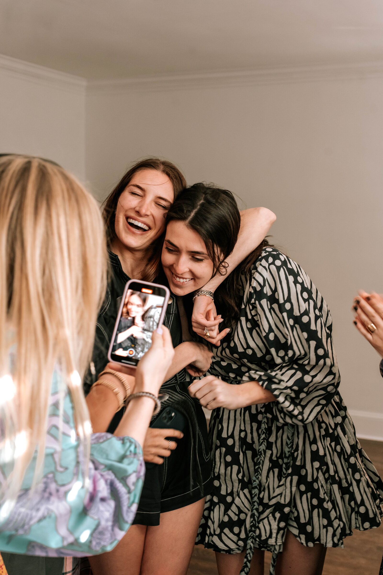 friends celebrate proposal 