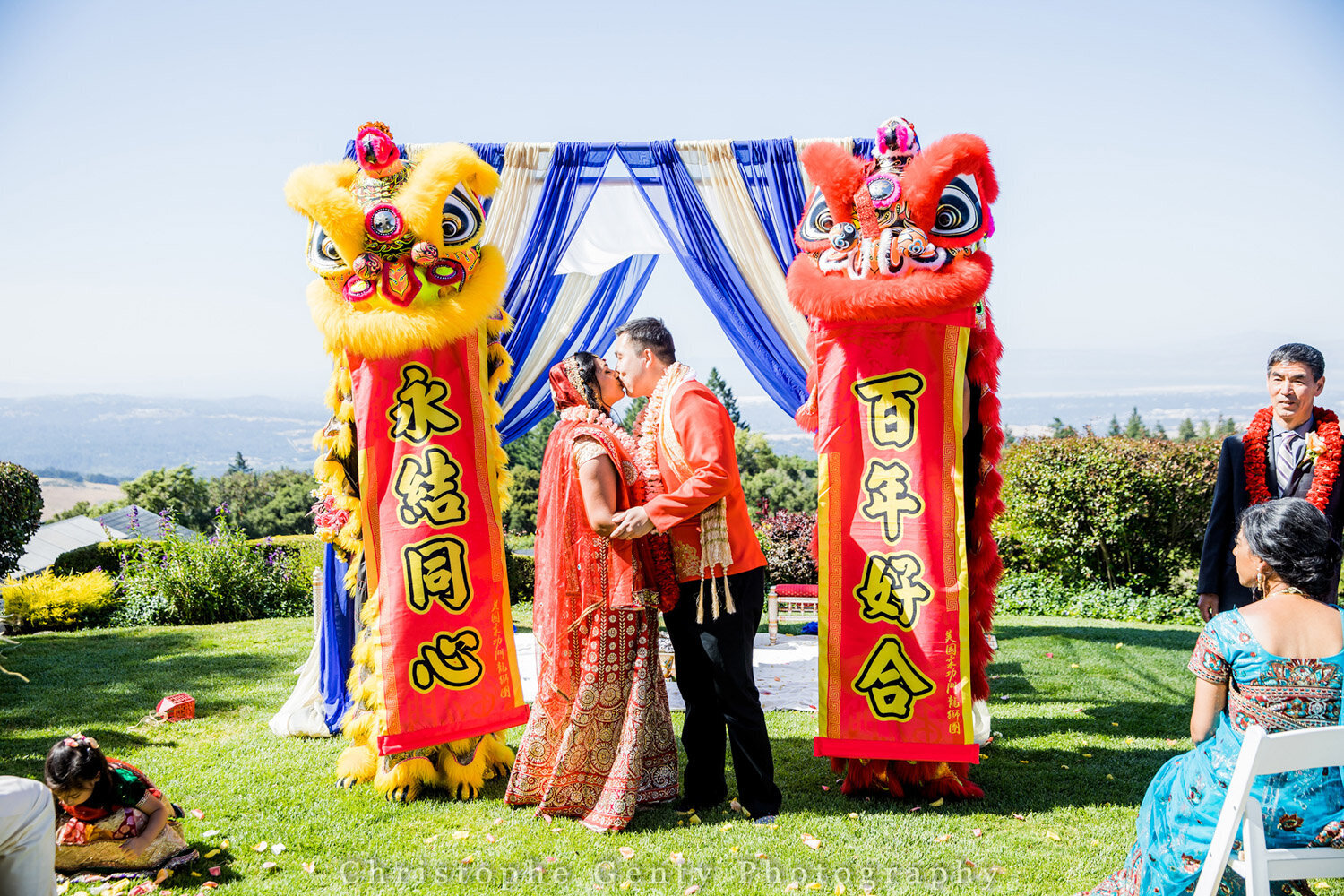 Wedding couple with Chinese lion dance ceremony backdrop