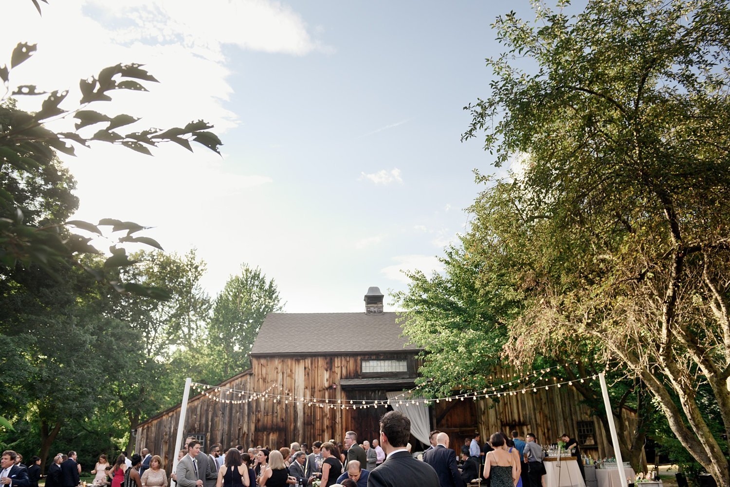 Rustic & glamorous wedding at The Webb Barn in Wethersfield with lawn games