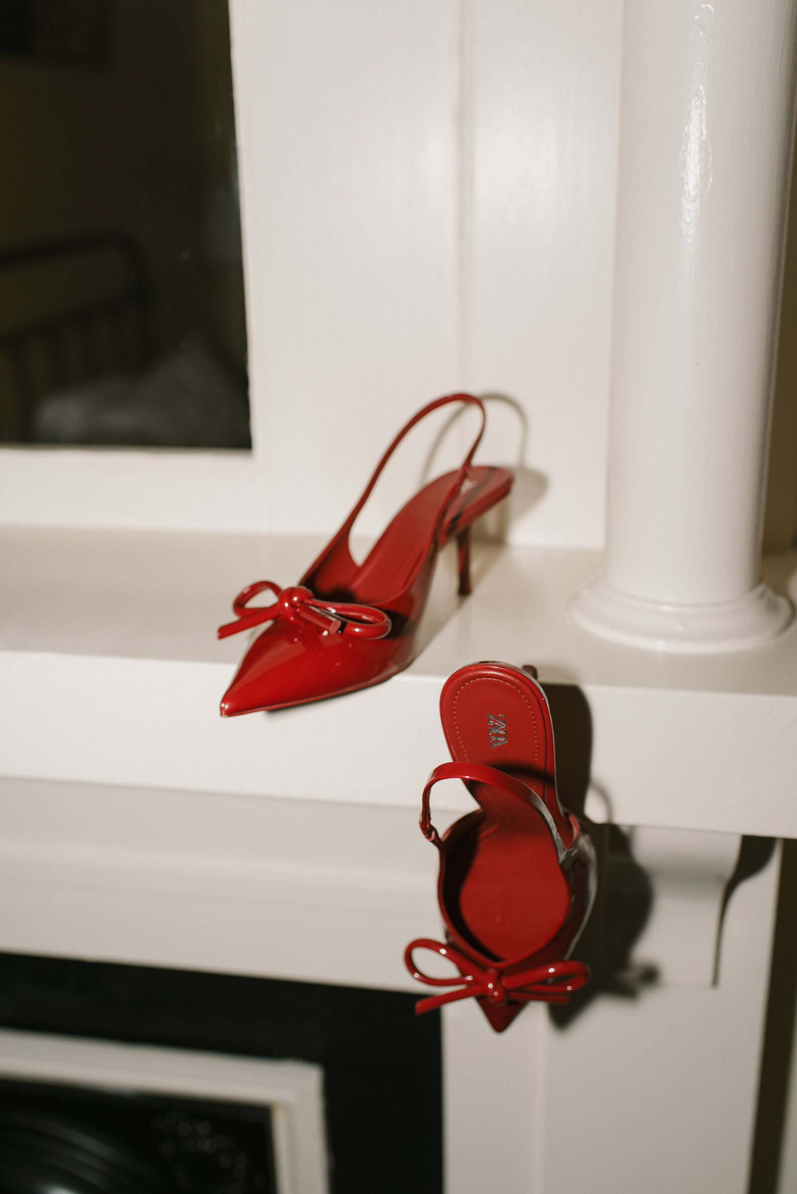flash editorial shot of red high heels