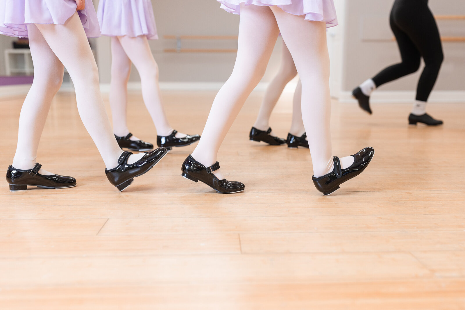 close up of tap dancer shoes