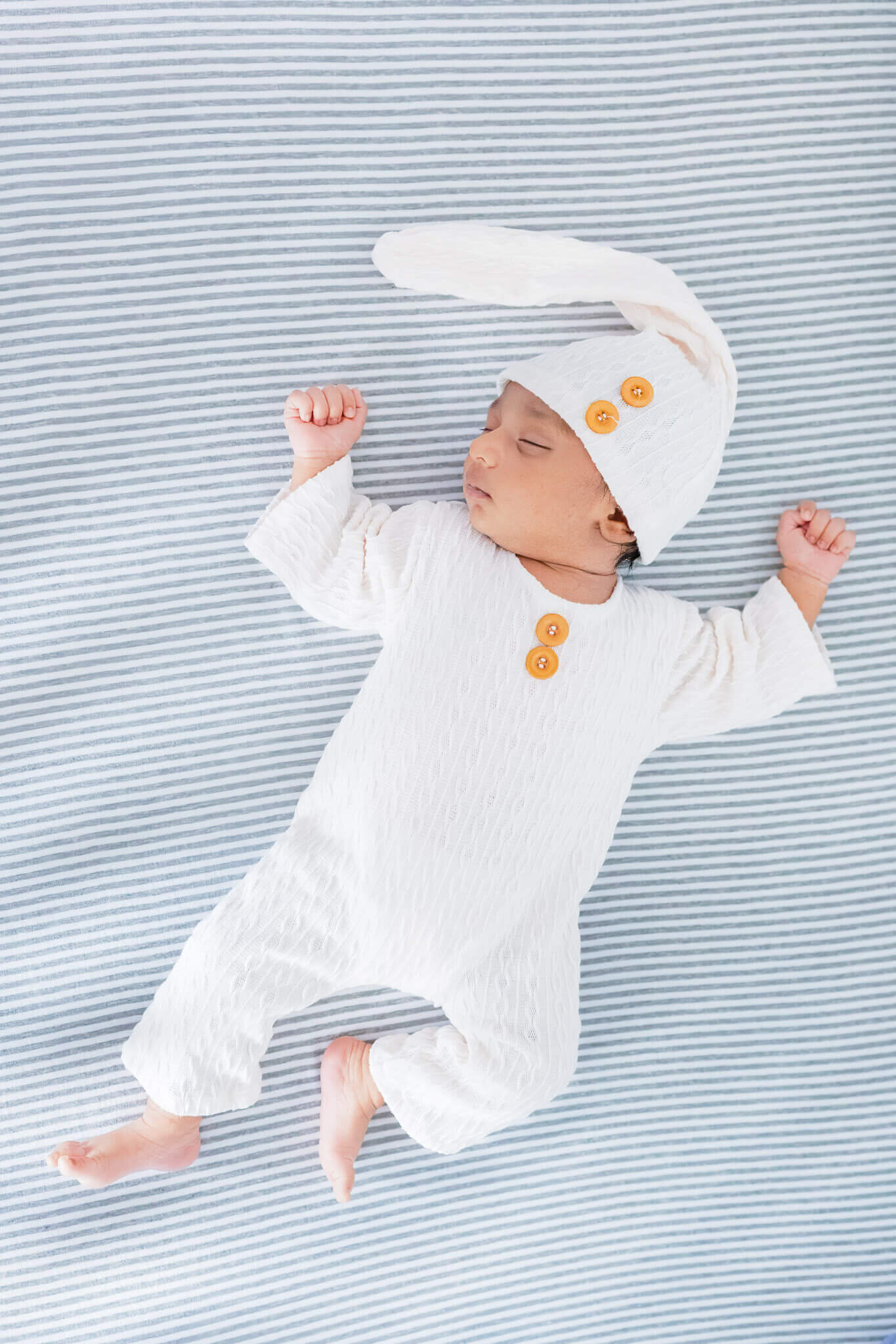 A Northern Virginia newborn boy sleeping in his crib.