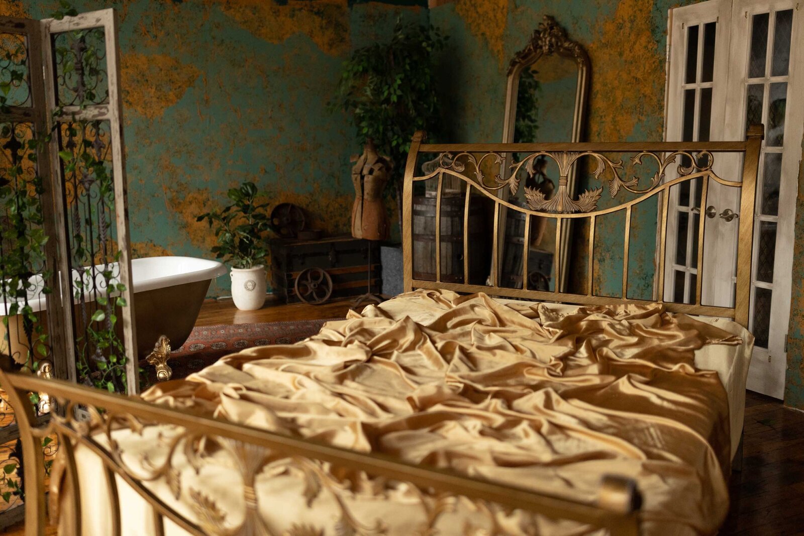 stories untold studio with gold bed setup