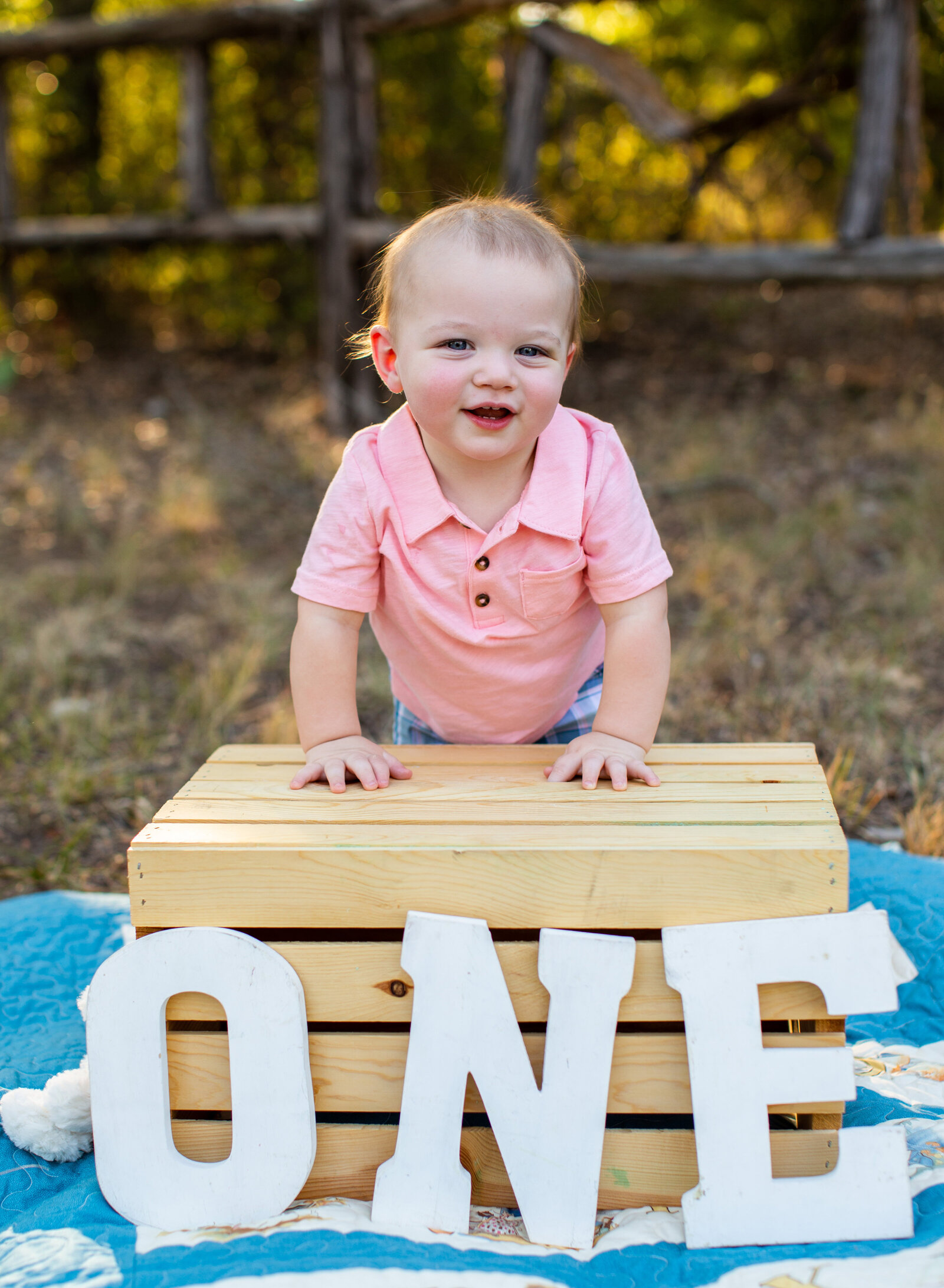 one year old boy smiling