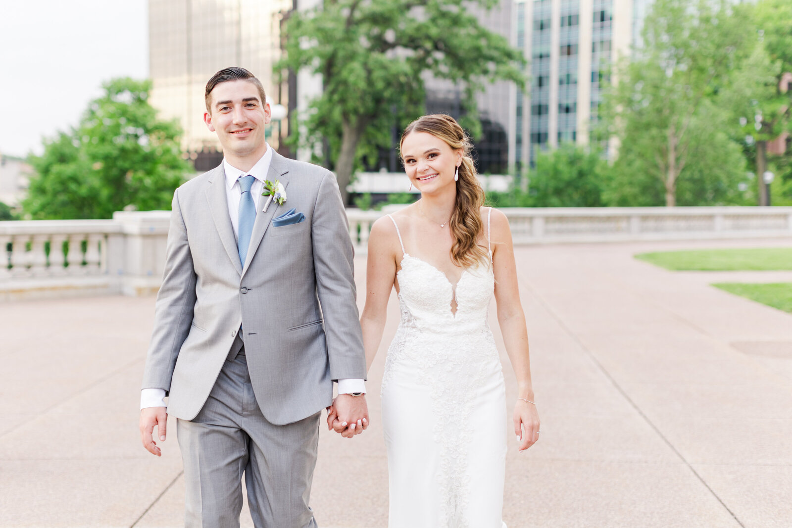 26_couple_at_golden_hour_walking_and_smiling_wisconsin_state_capitol