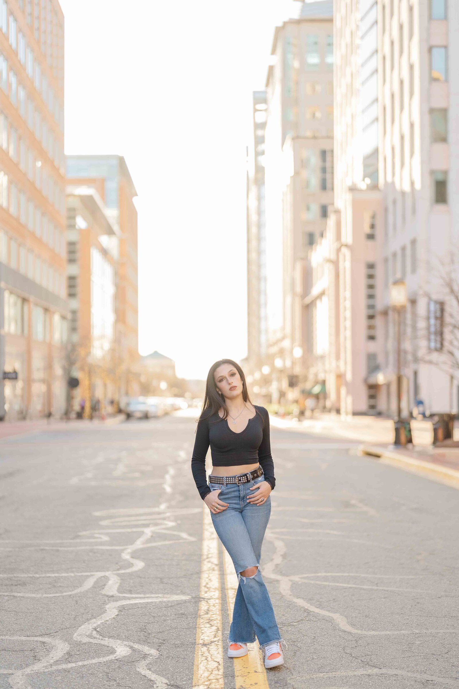 high school girl standing in the street during Reston, VA senior session