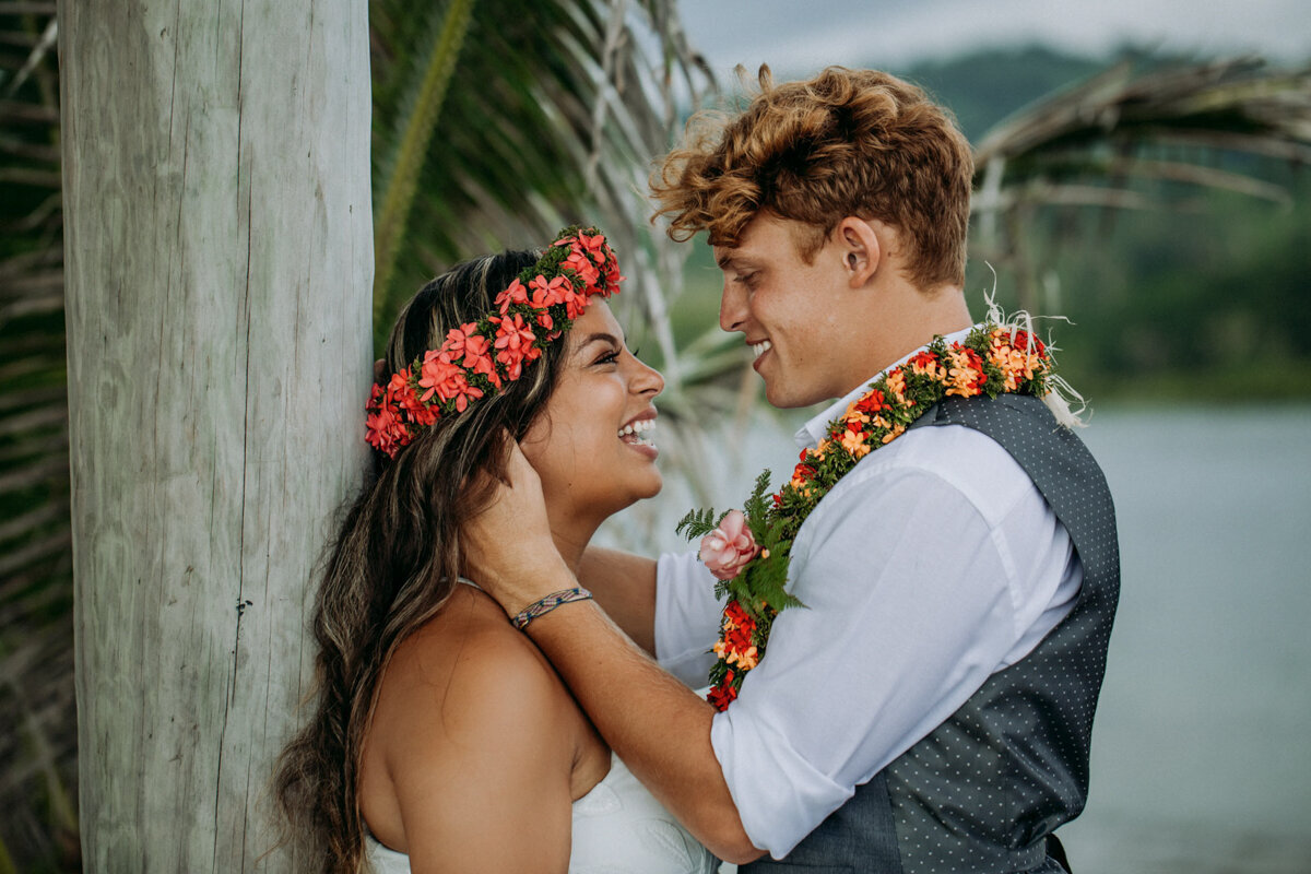 bride and groom with flower garlands