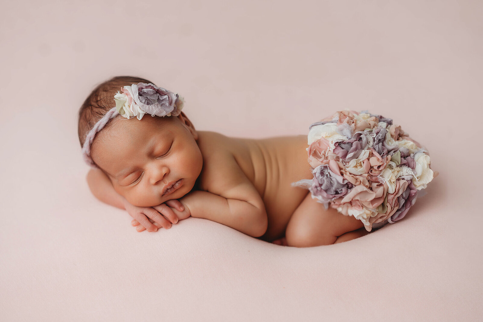 Newborn, Infant posed for Newborn Photos in Asheville, NC.