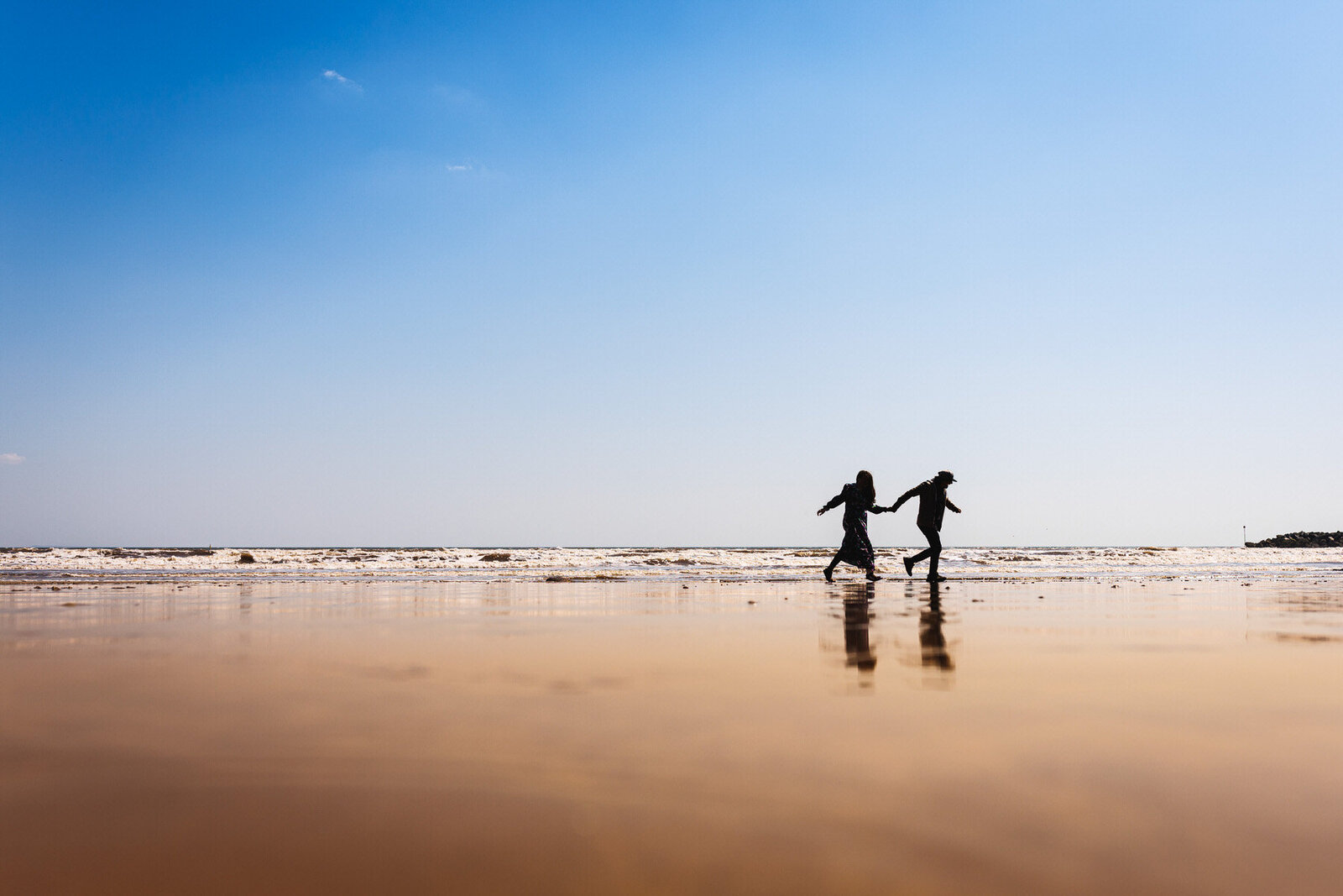 Kent Wedding Photographer_abbie colin lyme run on beach-110-1