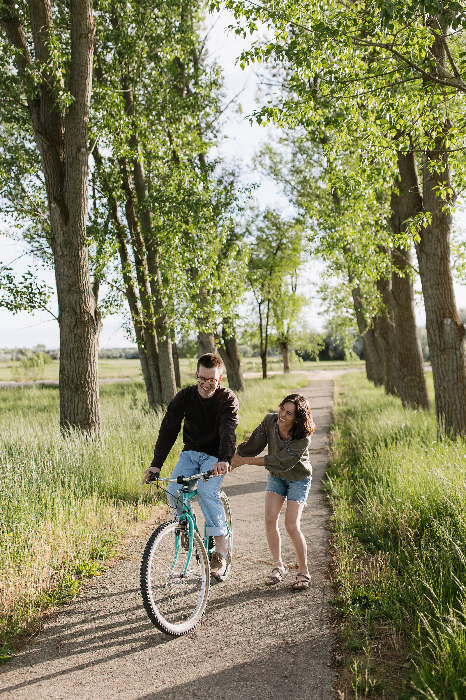Couple sharing moment on bicycle path during destination session