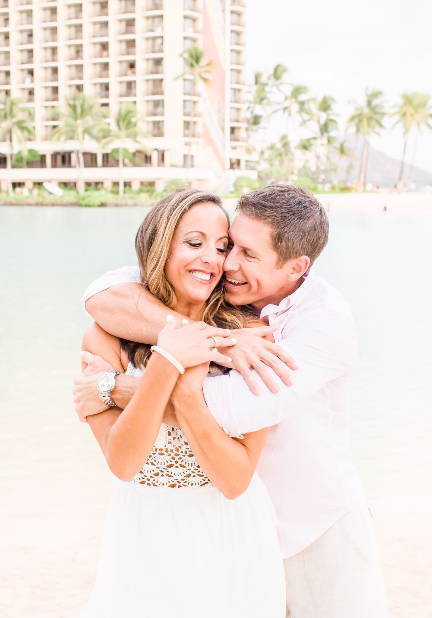 Hilton Hawaiian Village Wedding Photography, couple cuddled up and smiling