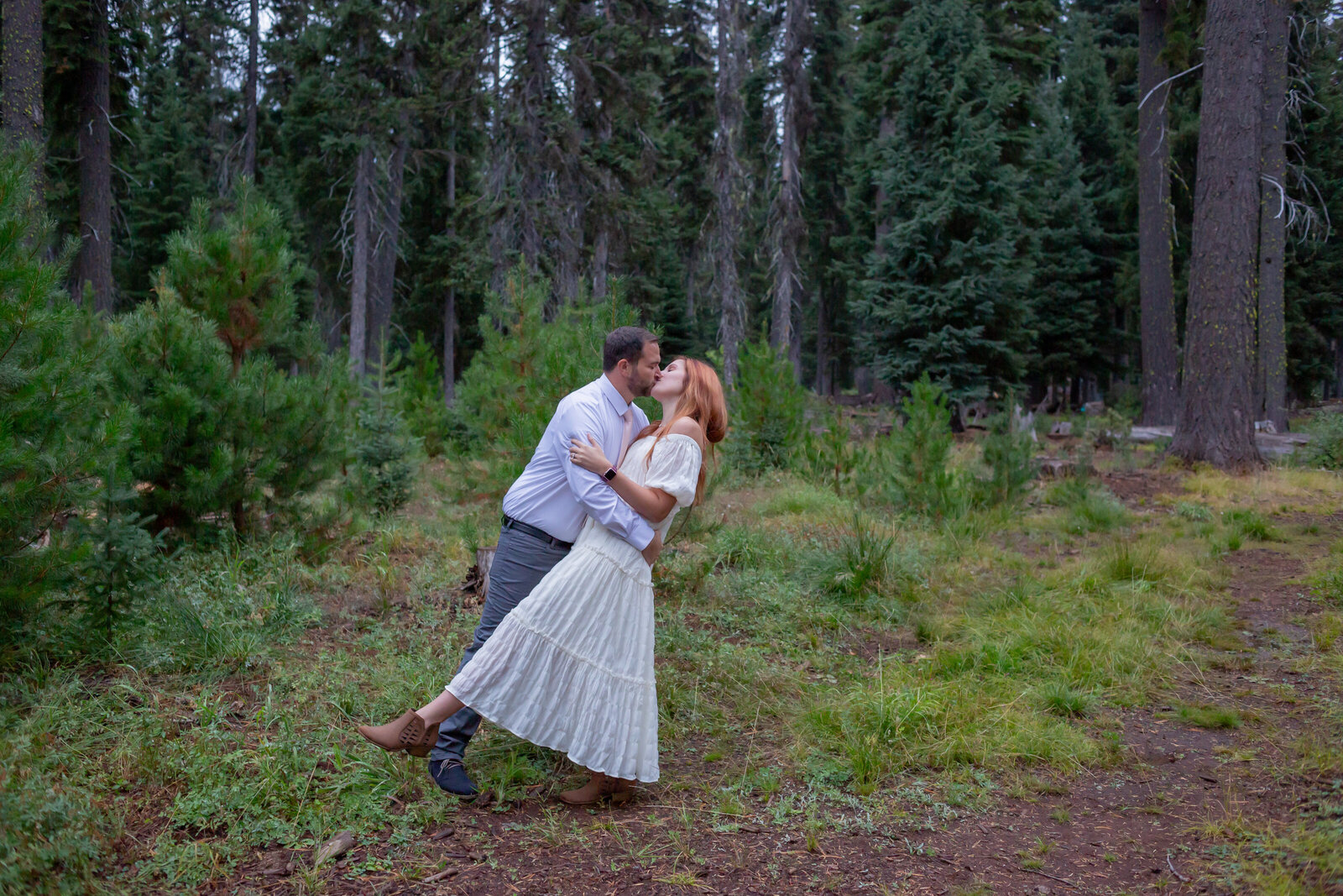 Seattle Wedding Photographer captures romantic couple kissing in the forest