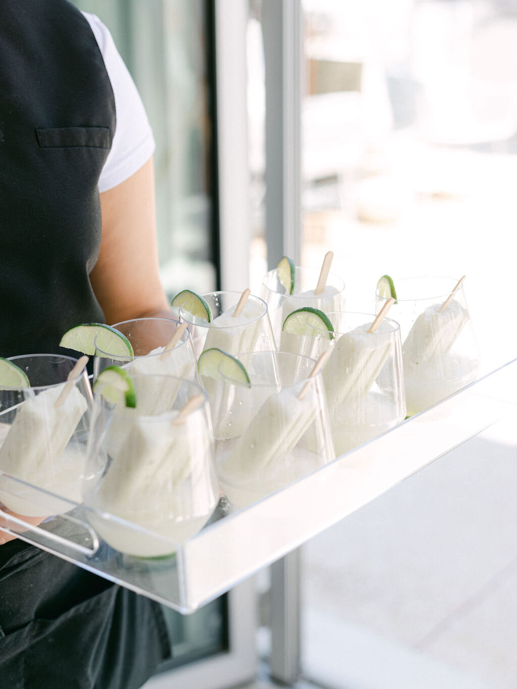 tray of wedding ice pops with cucumber  for summer  wedding reception at Rosemary beach Florida