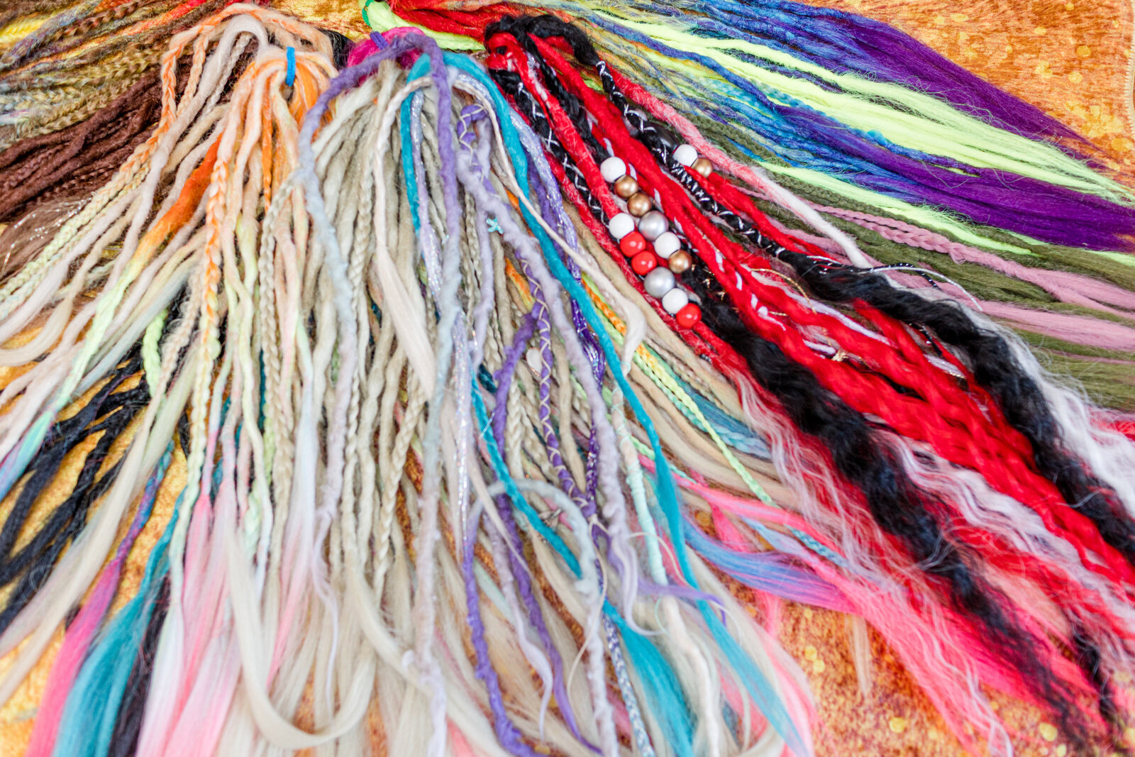 Find the perfect accessories for your dreadlocks, including clips, pins, and hair ties, at Let Me Live Locs - your one-stop shop for all things dreadlocks.