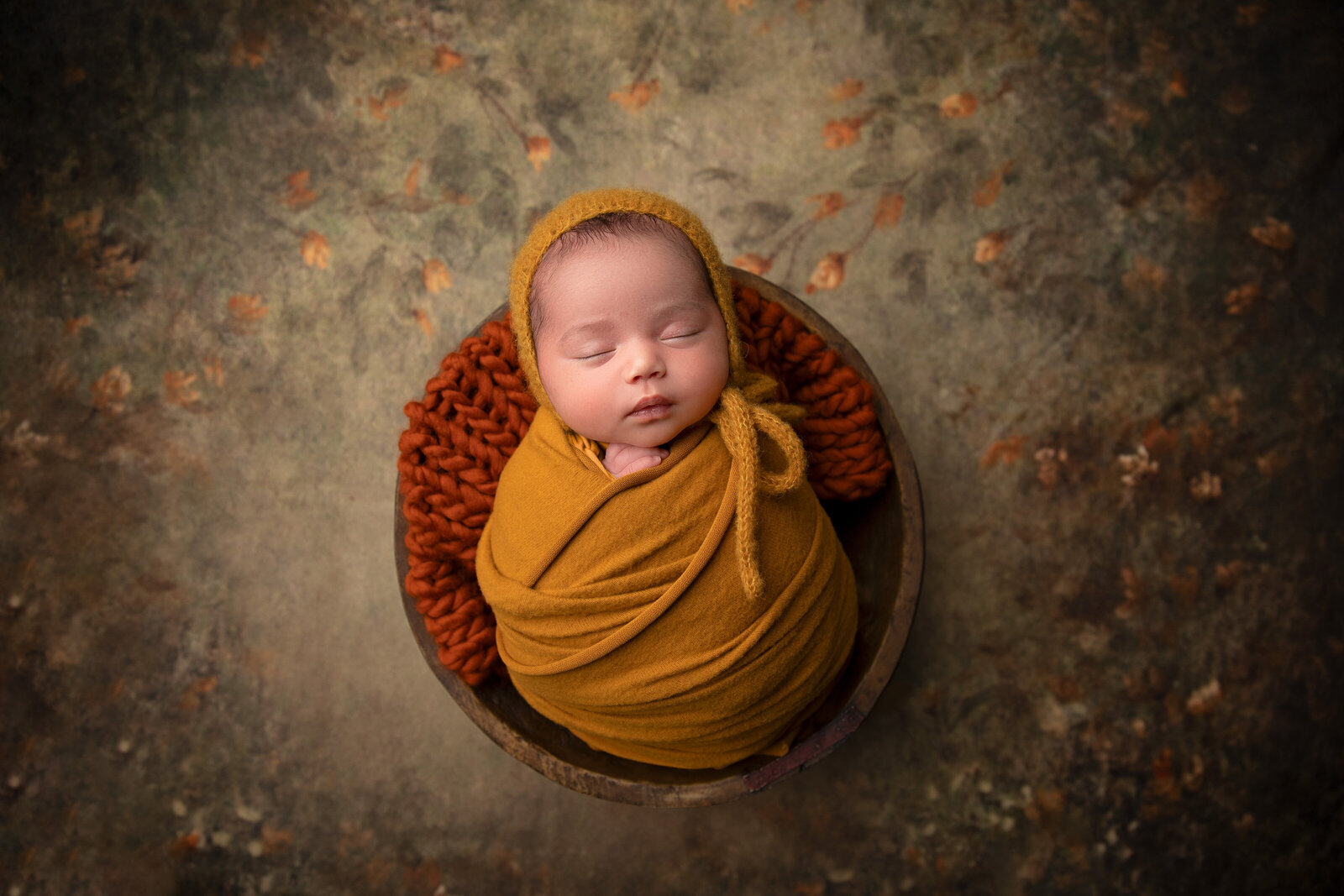 baby girl in fall colors