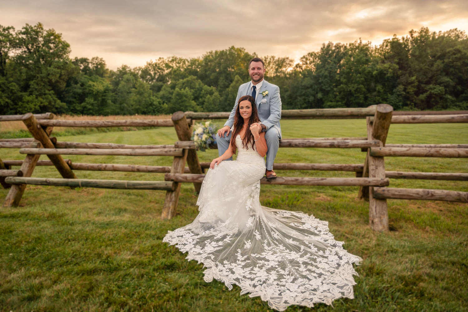 Elegant photo of wedding couple at the open field