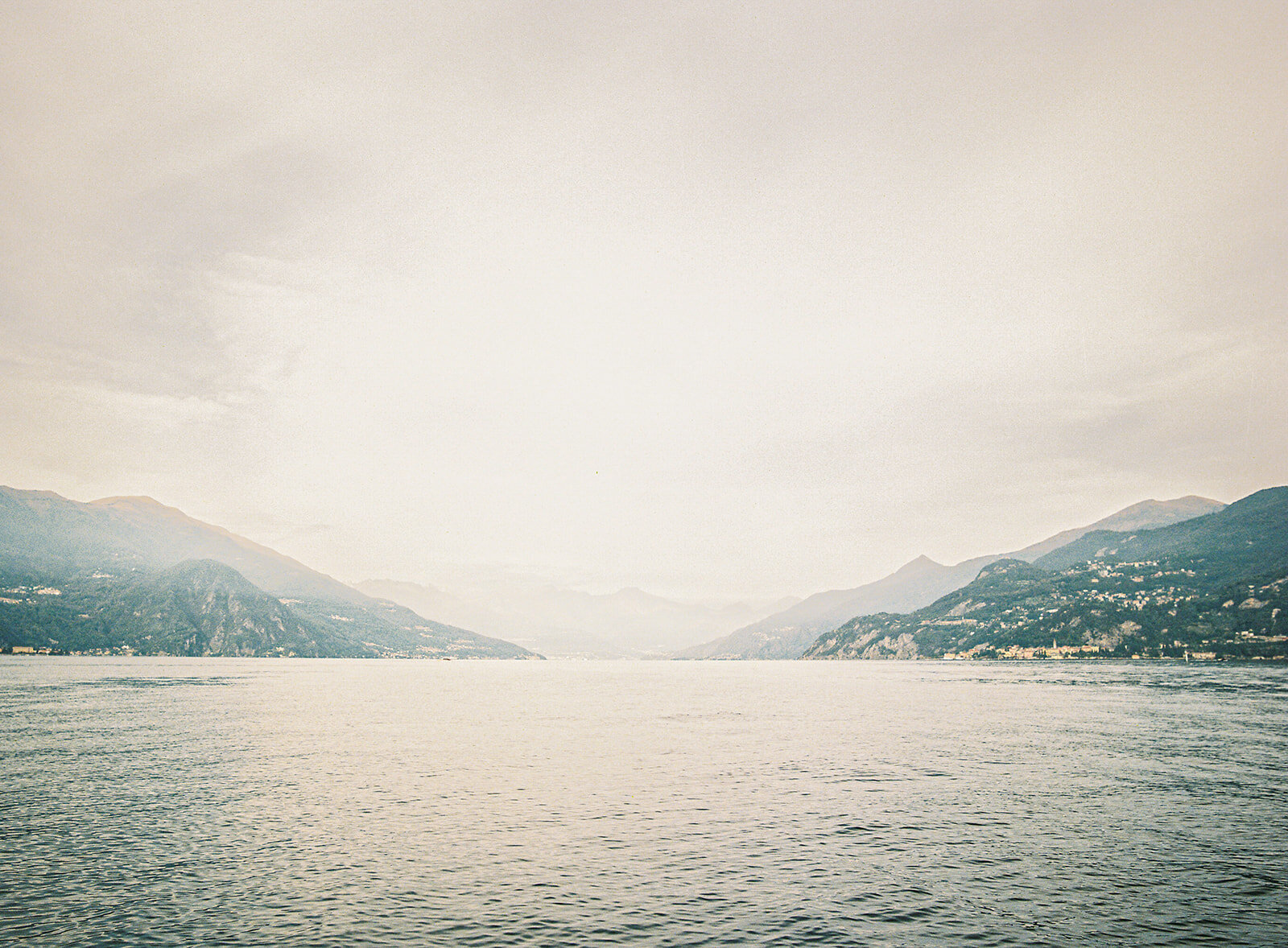 Boat engagement session on Lake Como Italy photographed by Lake Como wedding photographer Amy Mulder Photography