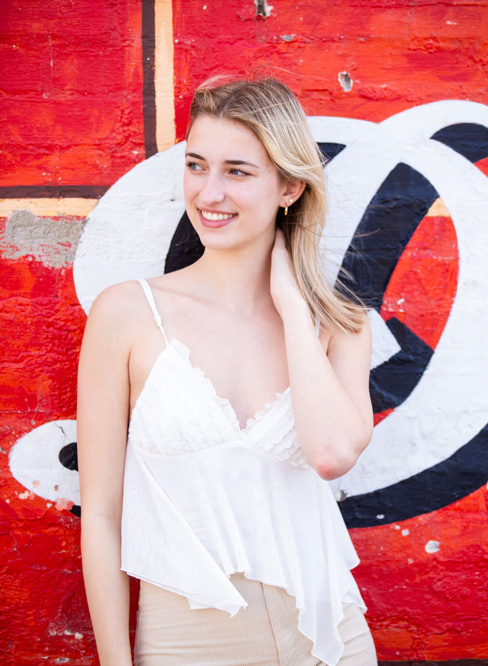 senior girl by mural