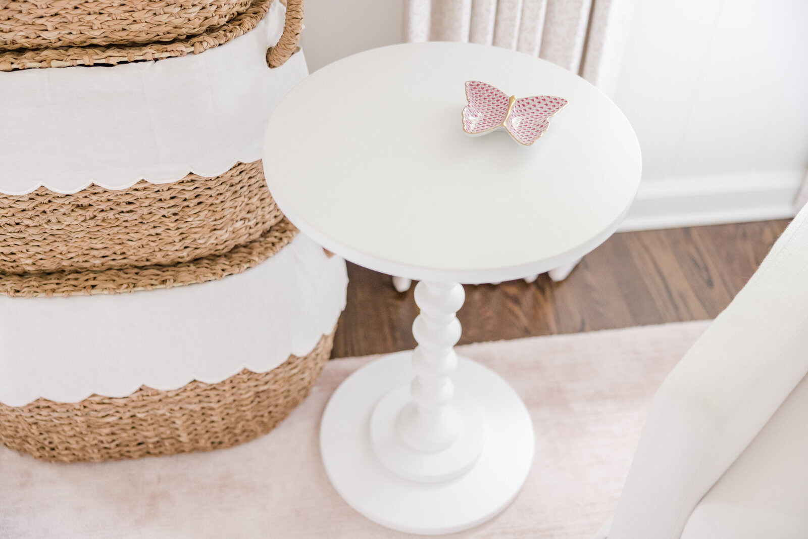 White side table with Herend butterfly dish.
