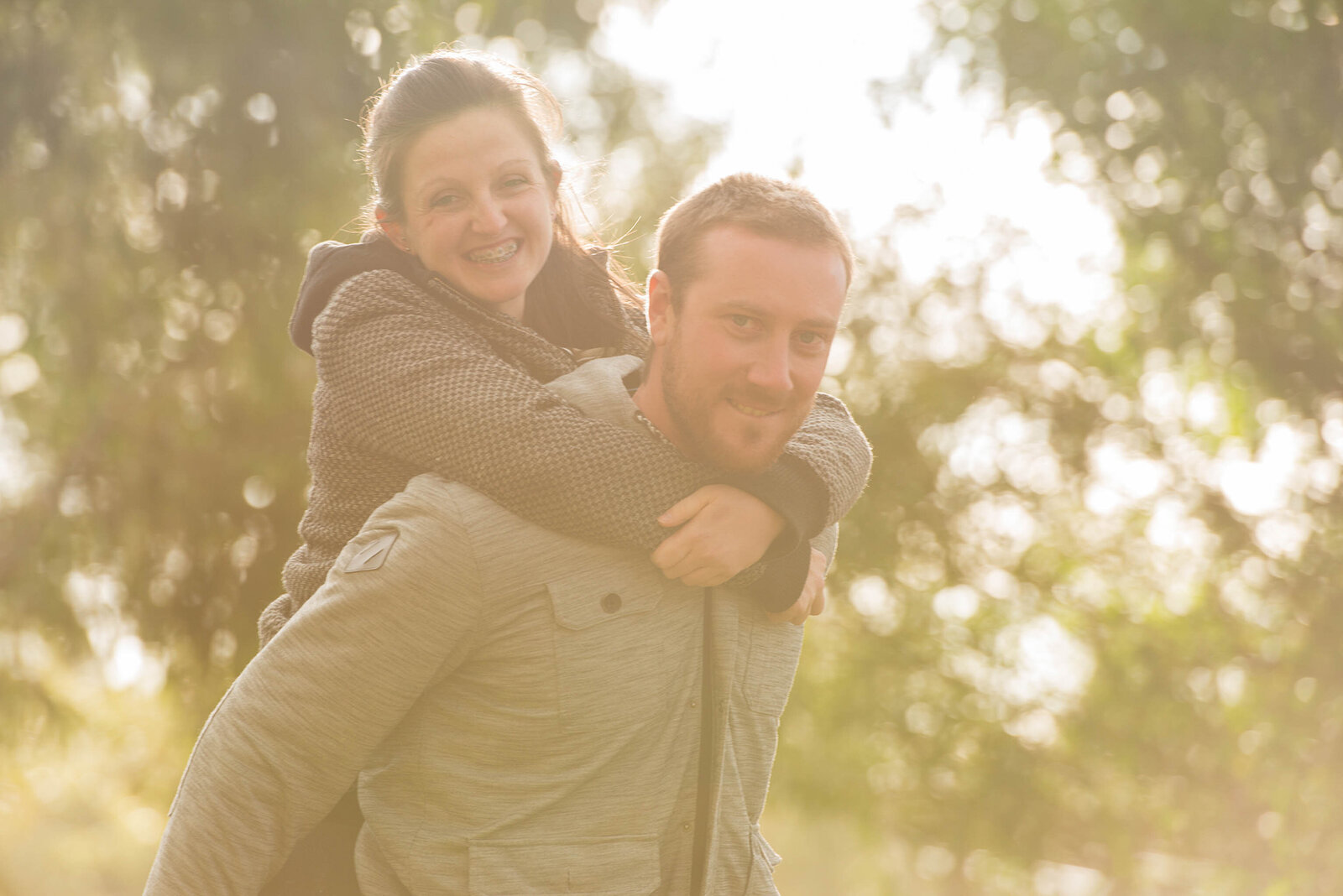 couple piggy back ride