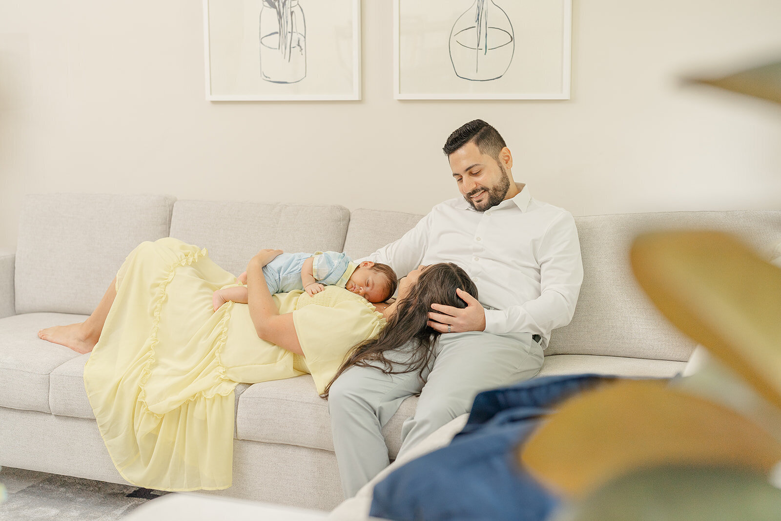 baby sleeping on mom during indoor family photo in Leesburg, VA