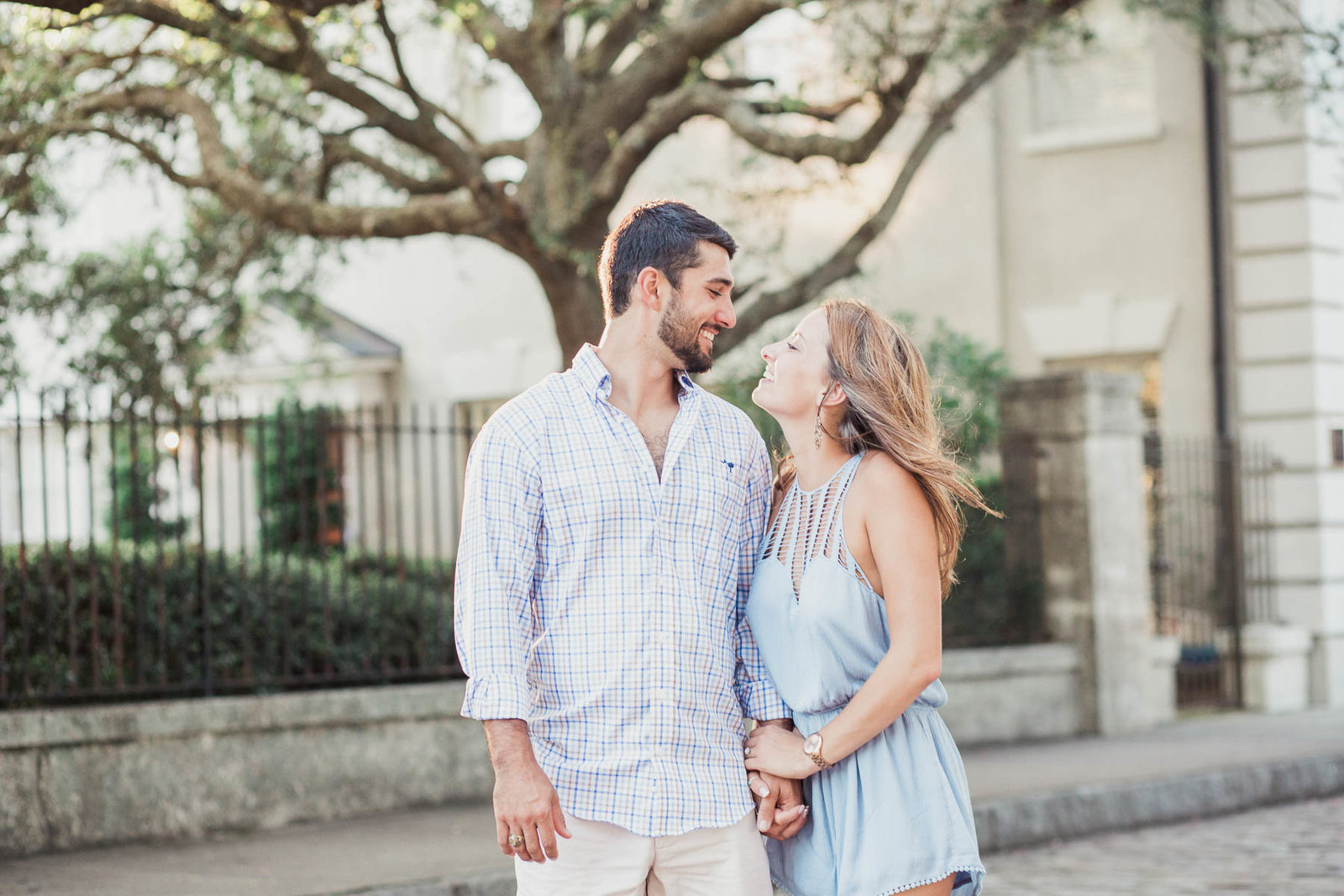 Engaged couple walking down path, Waterfront Park, Charleston, South Carolina