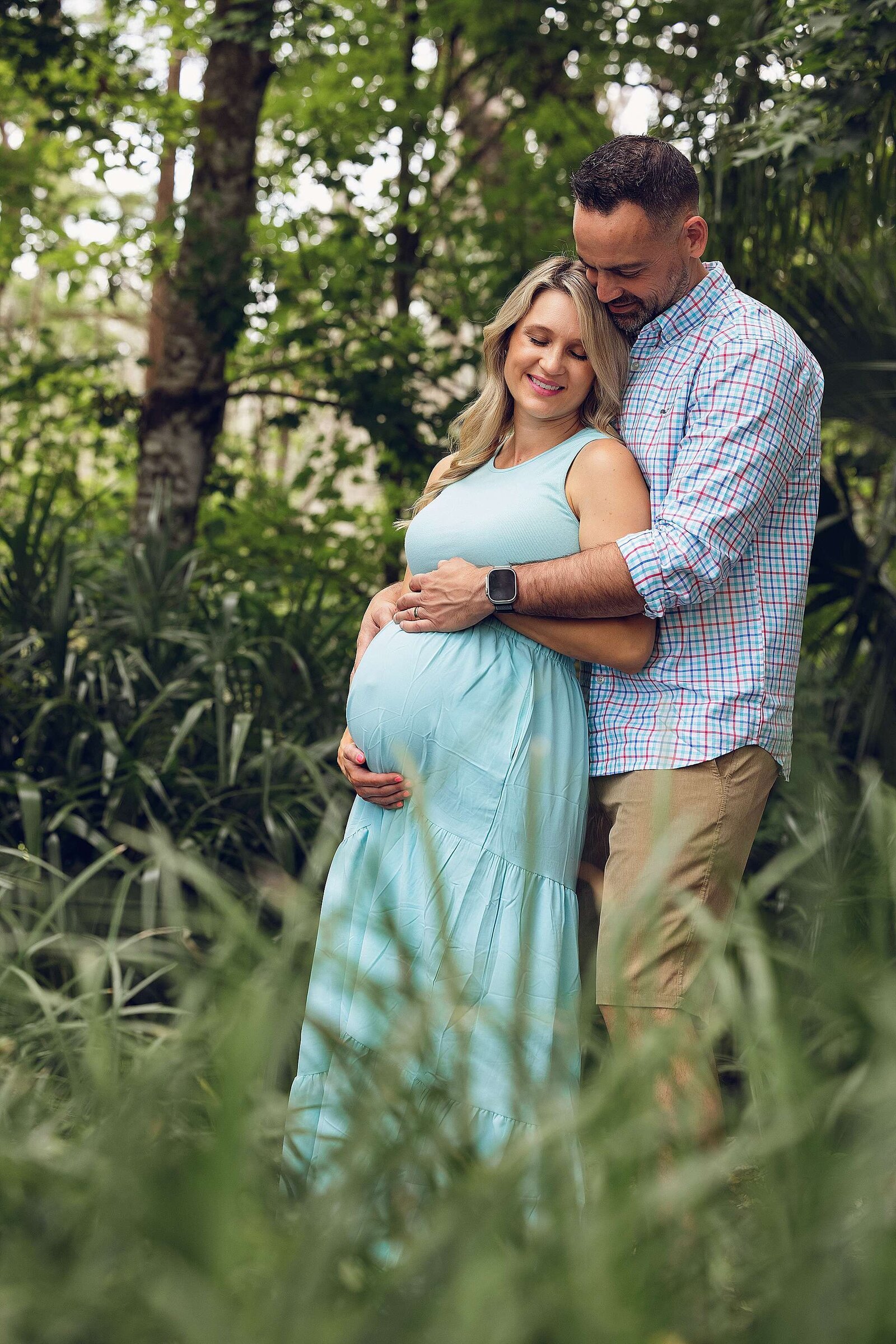 Expecting mother pose gracefully in Orlando, captured by Bia Schaefer photography, celebrating the journey of motherhood.