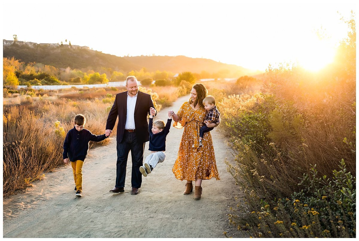 Portrait of a family walking on a trail in San Diego