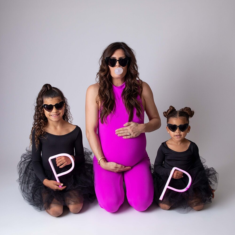 pregnant mom with 2 kids in tutus