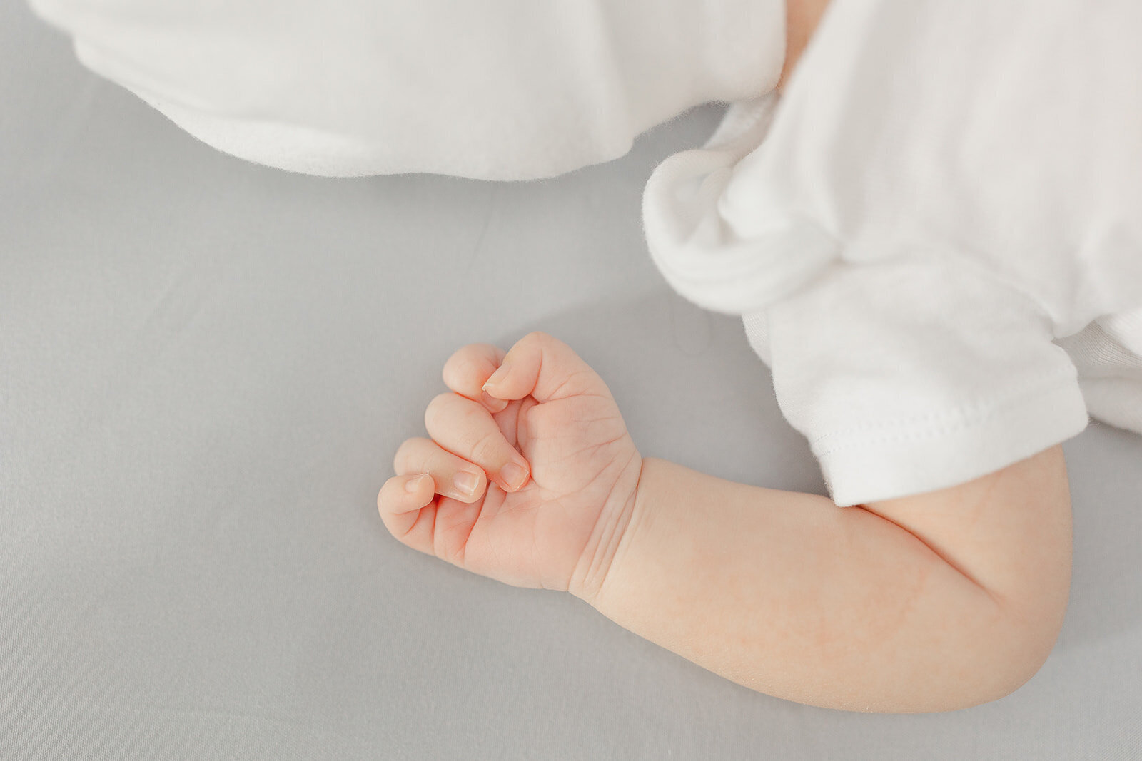 baby's hand during newborn photo in Sterling, VA